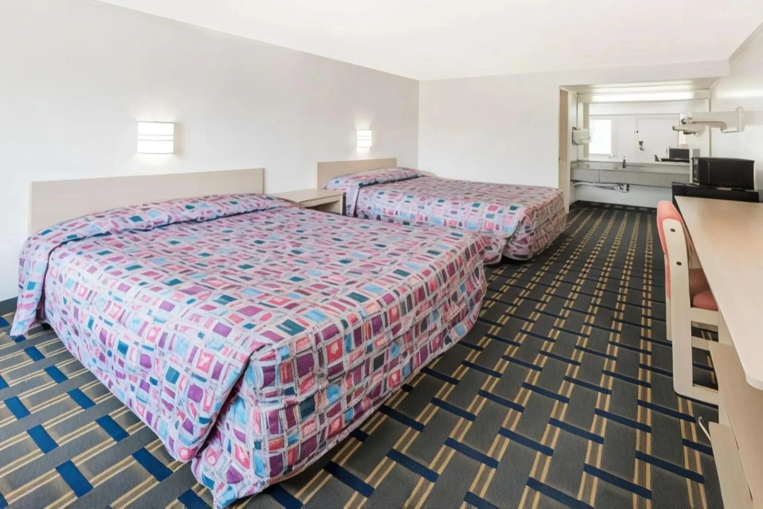 Bed in Hilliard Motor Lodge