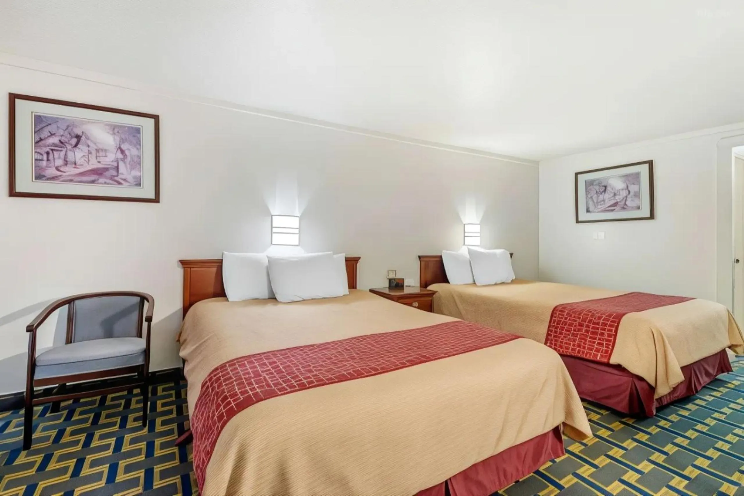 Bed in Hilliard Motor Lodge