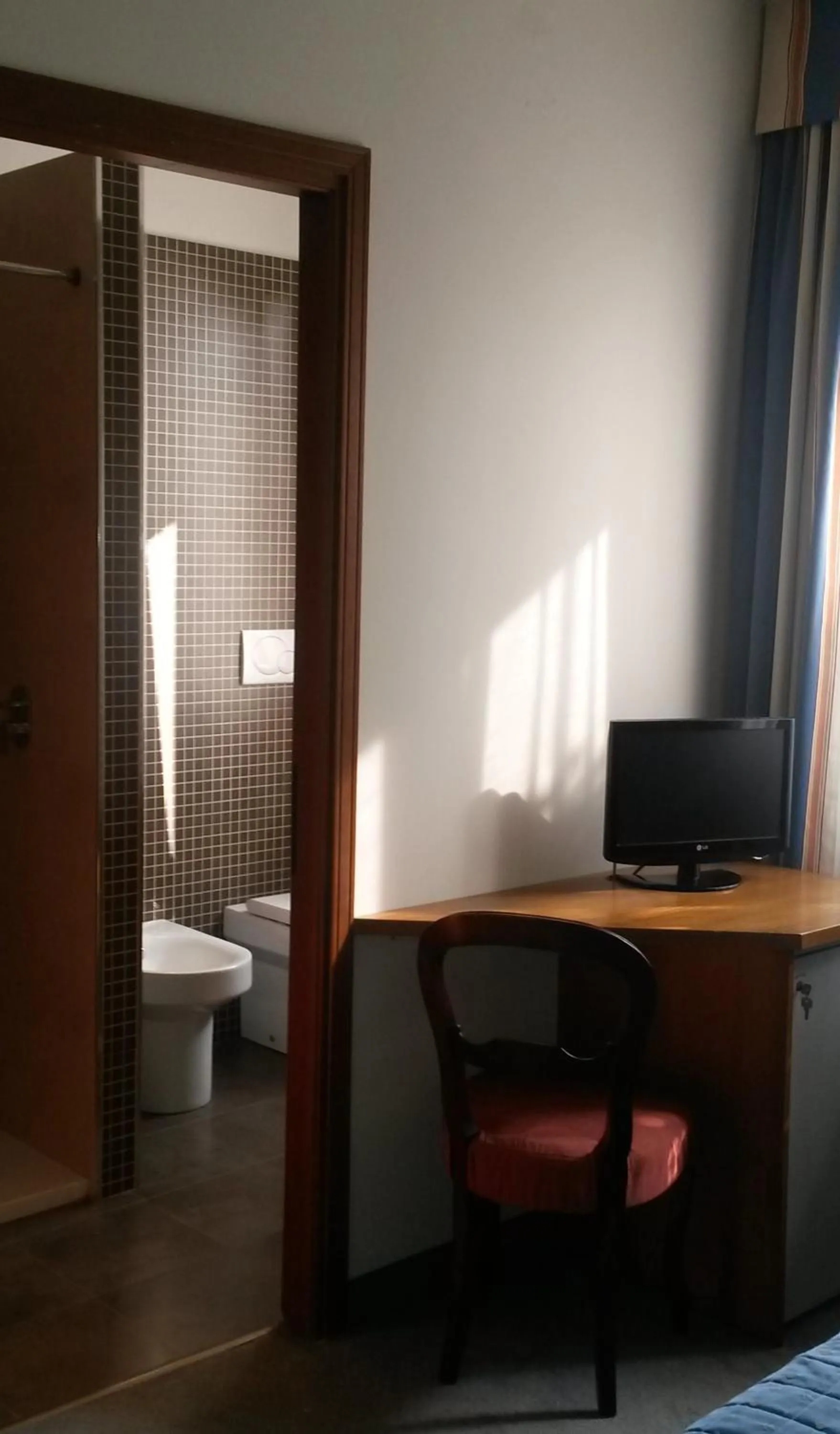 Bathroom in Cravero Rooms