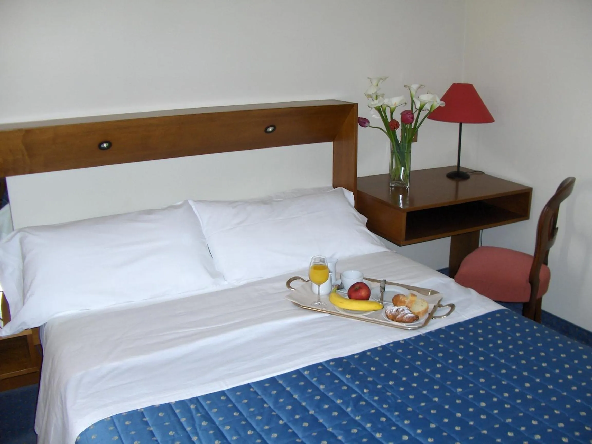 Bed in Cravero Rooms