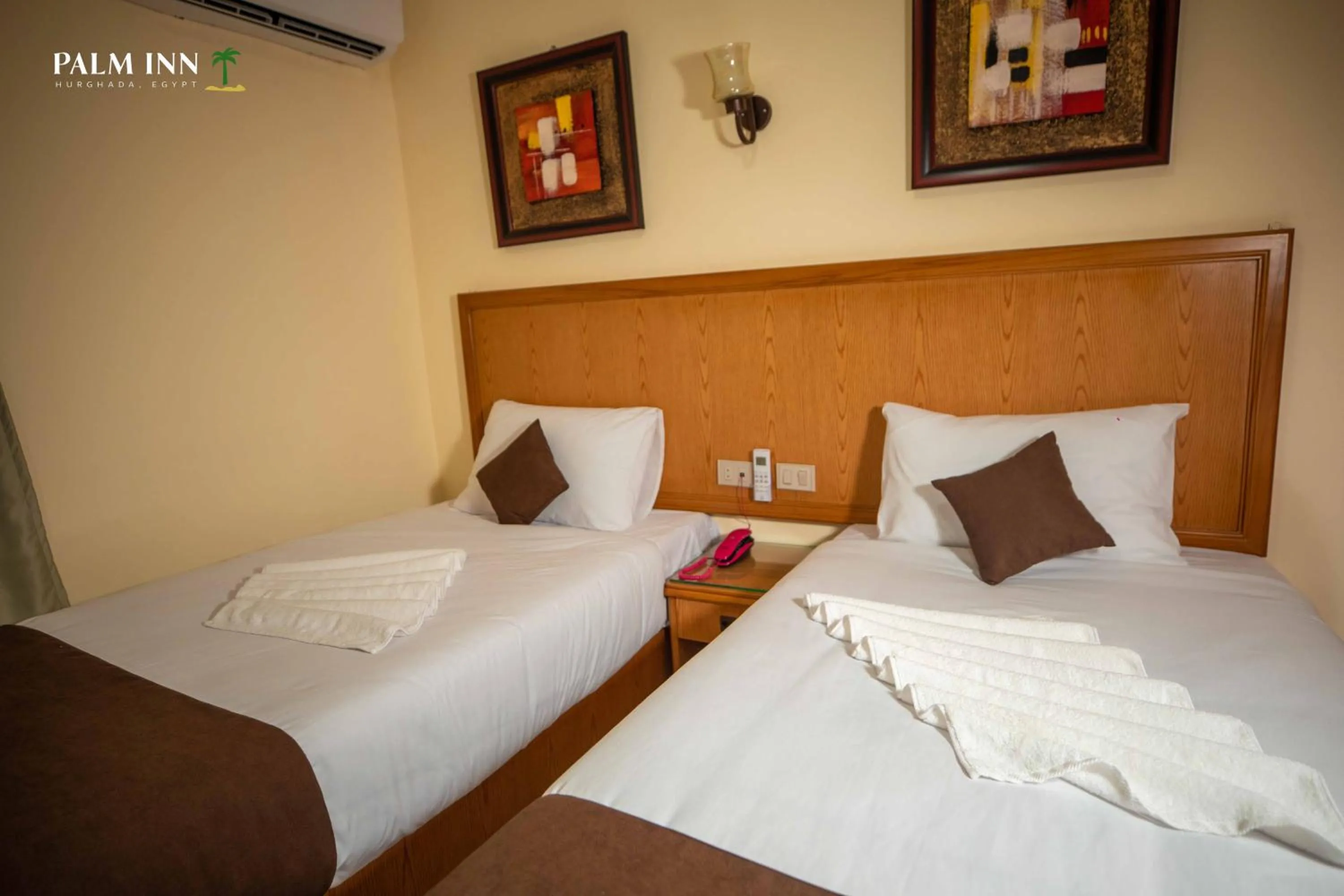 Bed in Palm Inn Hotel Hurghda