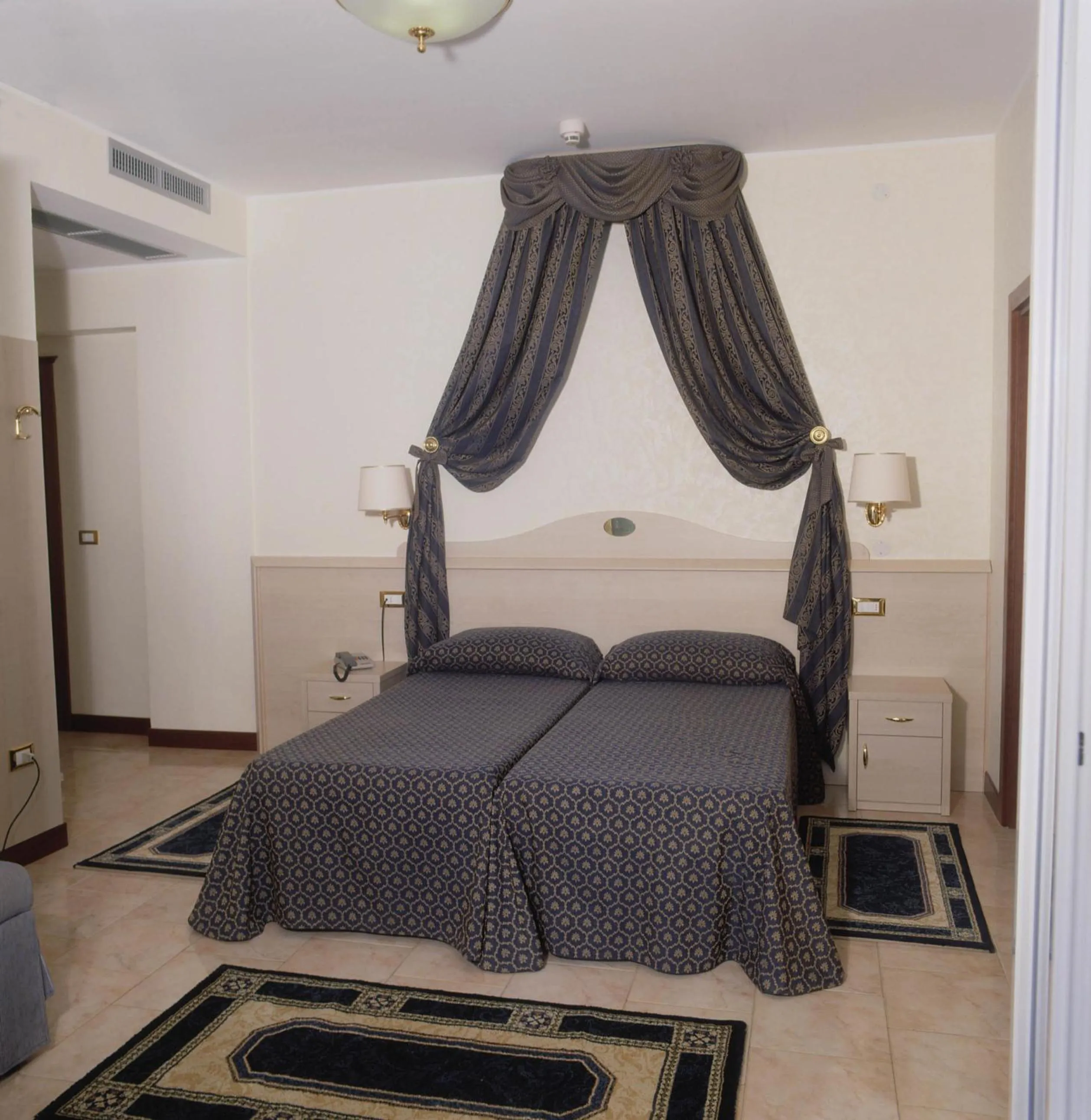 Bed in Hotel Caravelle&MiniCaravelle