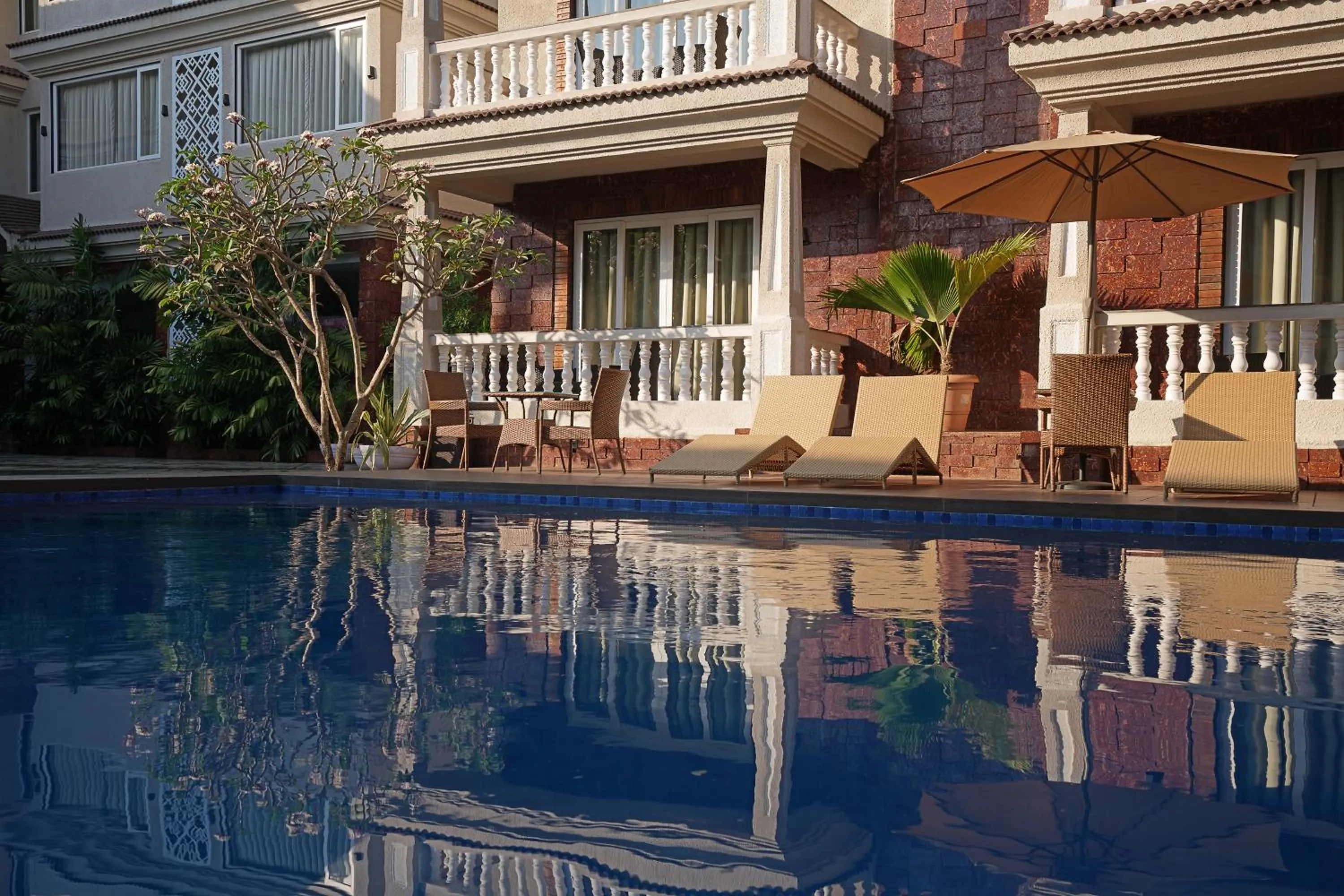 Swimming pool in Grand Continent Anjuna A Sarovar Portico Affiliate Hotel