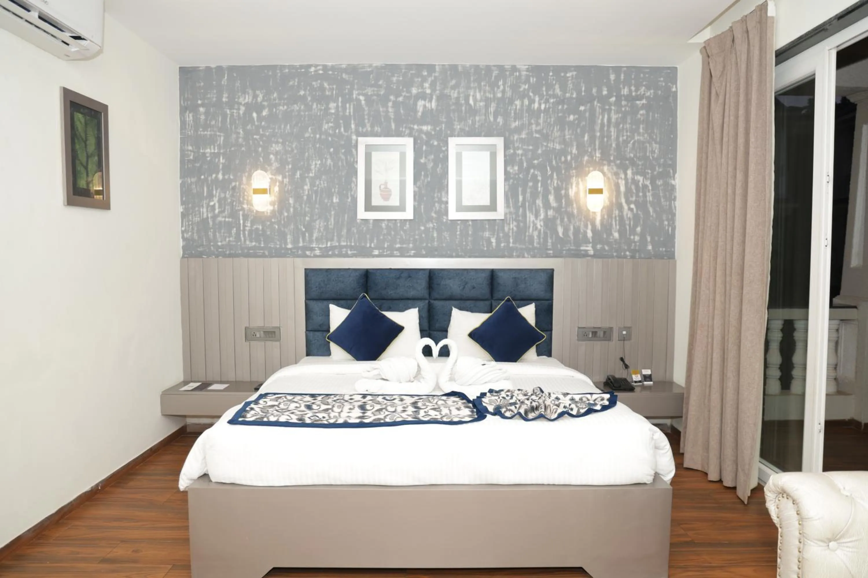 Photo of the whole room, Bed in Grand Continent Anjuna A Sarovar Portico Affiliate Hotel