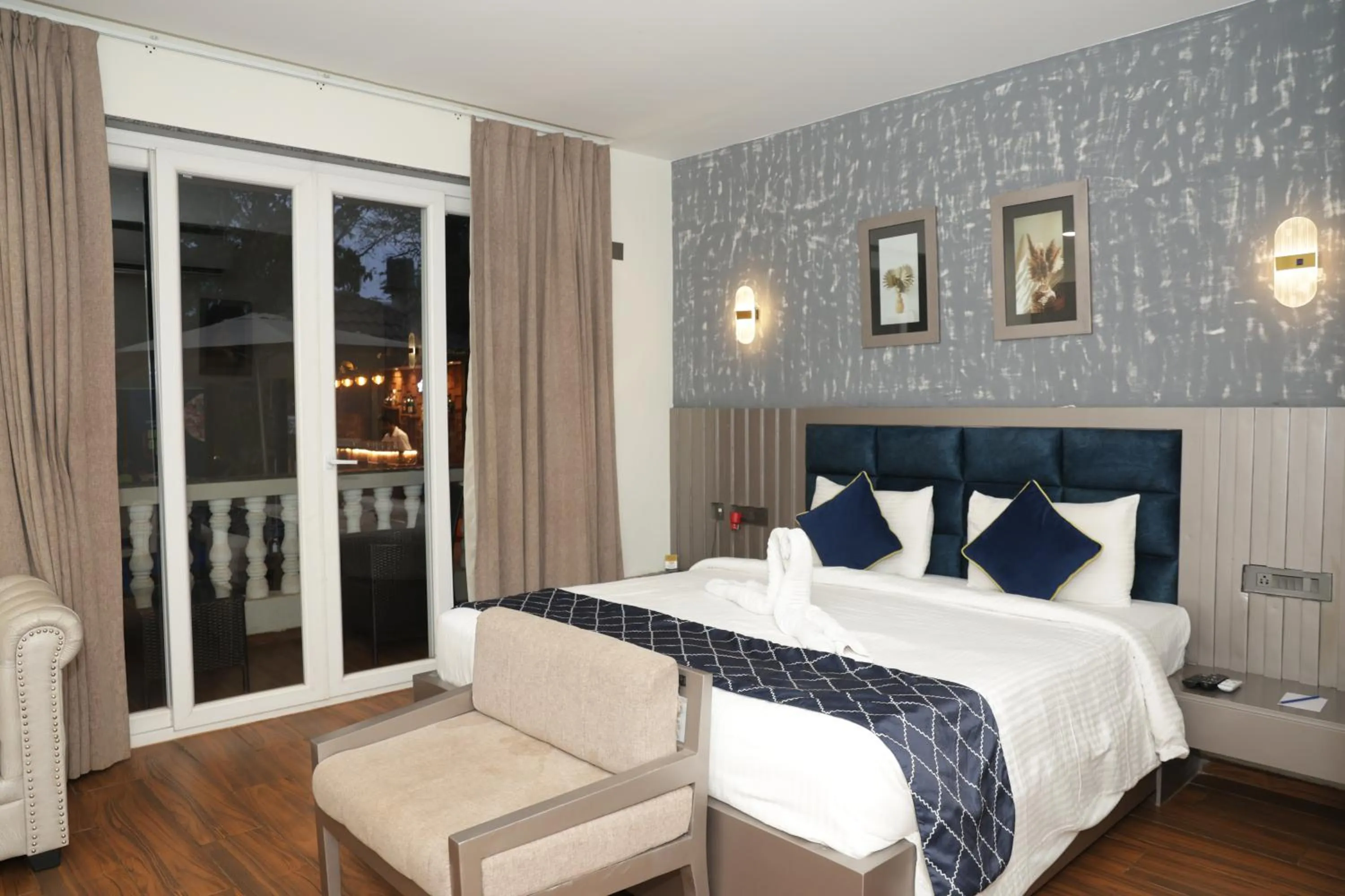 Balcony/Terrace, Bed in Grand Continent Anjuna A Sarovar Portico Affiliate Hotel