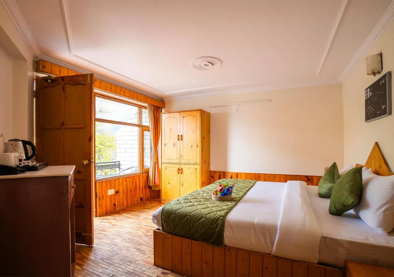 Photo of the whole room, Bed in Moustache Manali