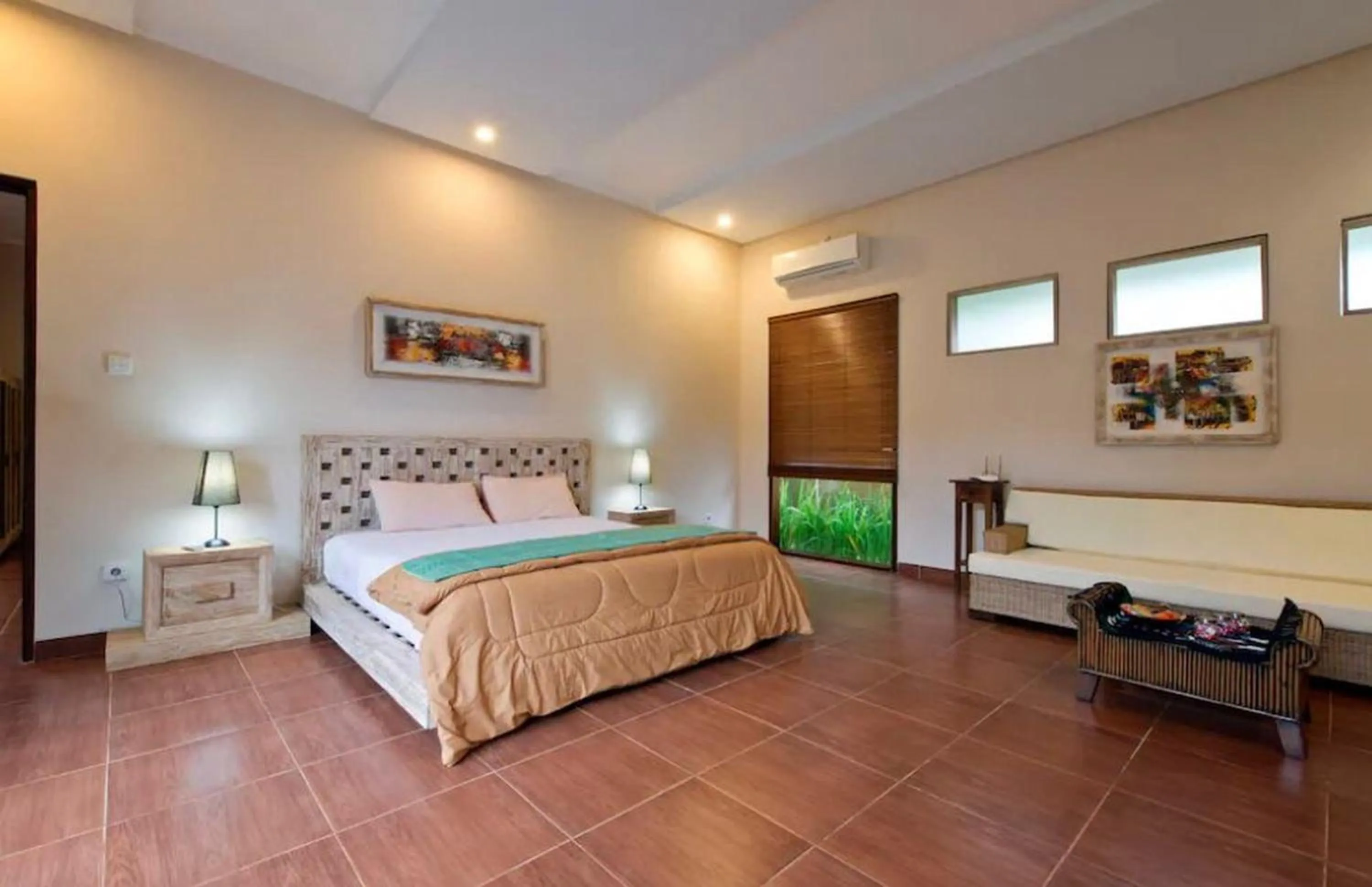 Bed in Bukawa Lodge Jimbaran