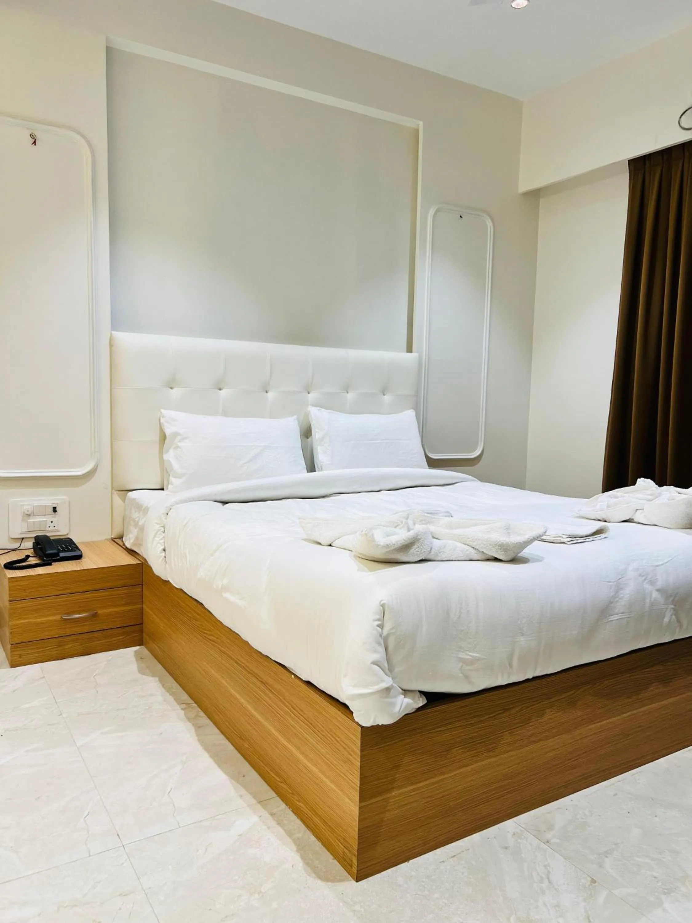 Bed in The Grand Leela Resort