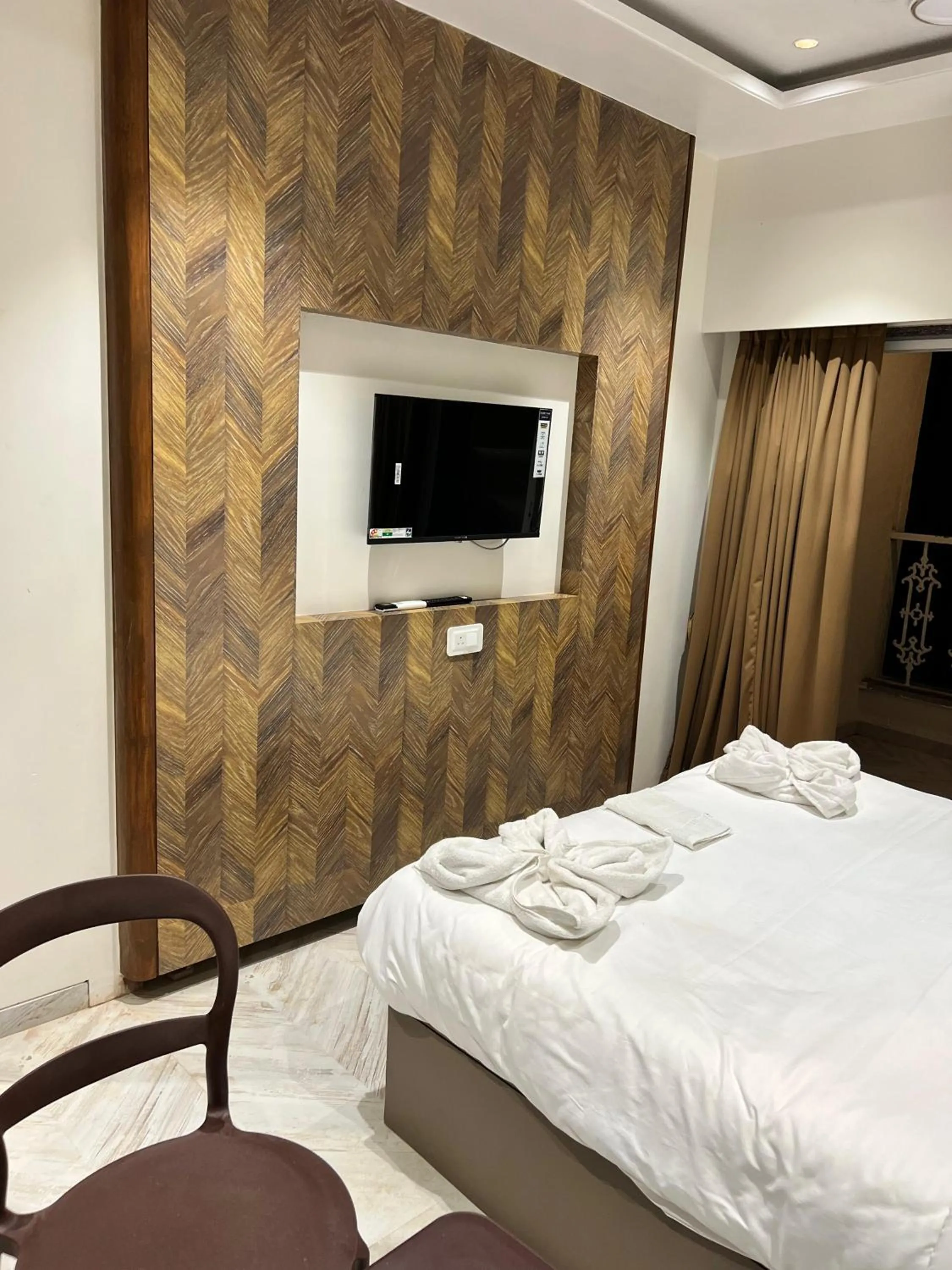 Bed in The Grand Leela Resort