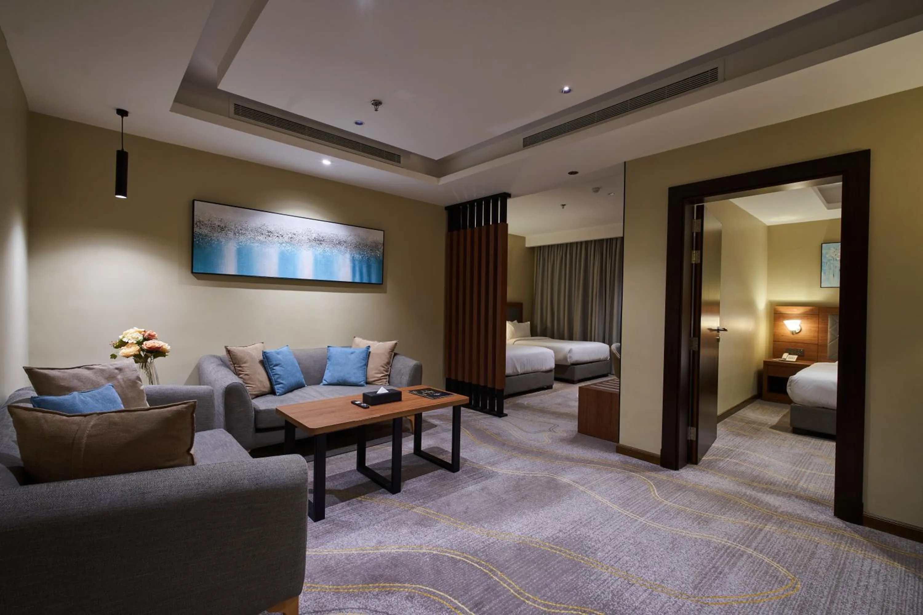 Communal lounge/ TV room, Bed in Platinum Hotel