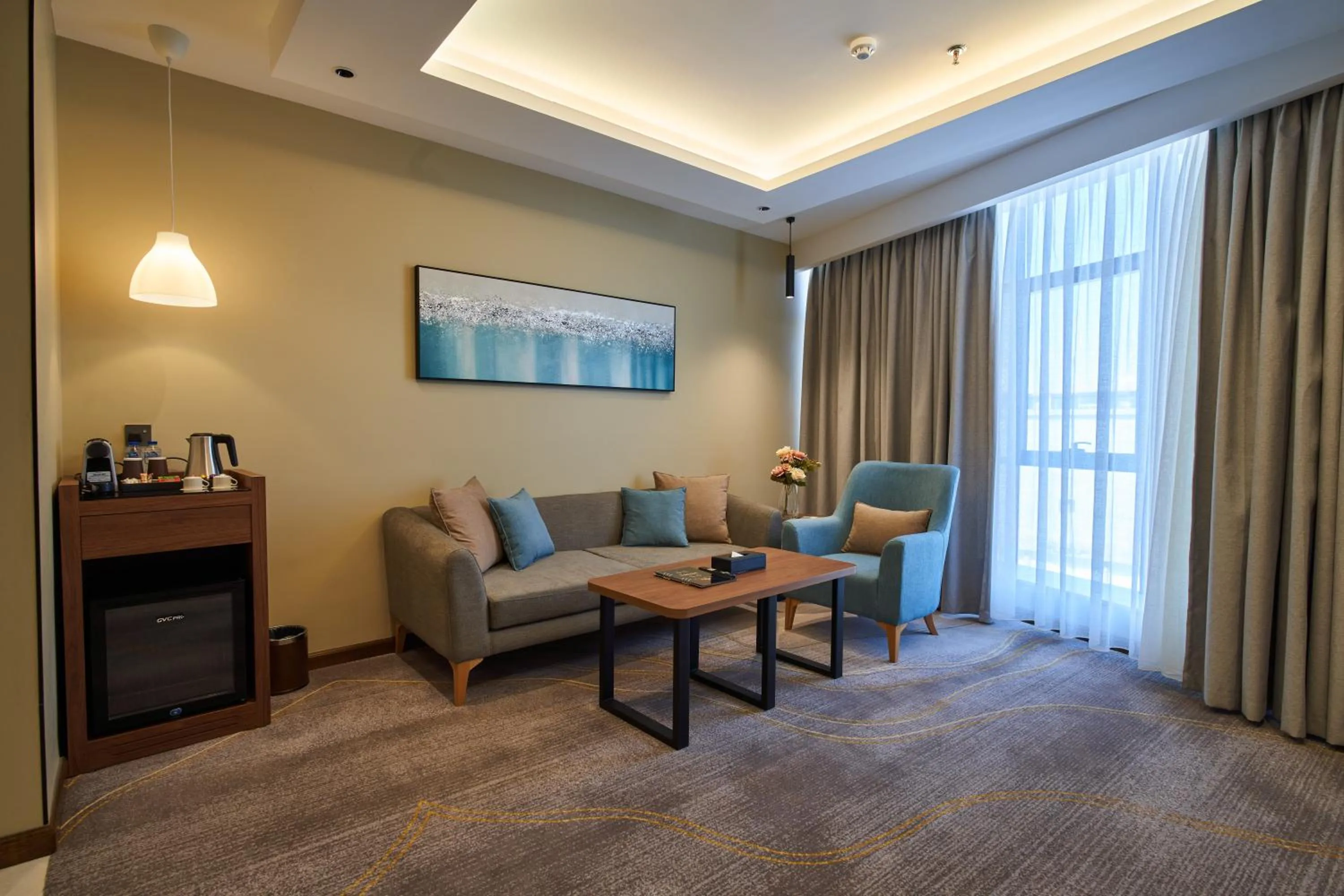 Communal lounge/ TV room in Platinum Hotel