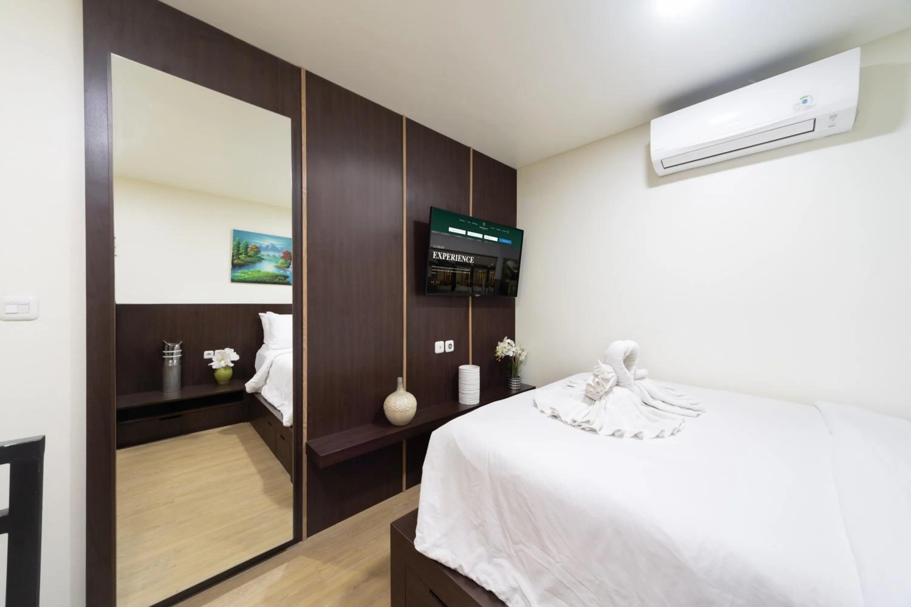 Bed in Verdant Bali Tirta Lepang