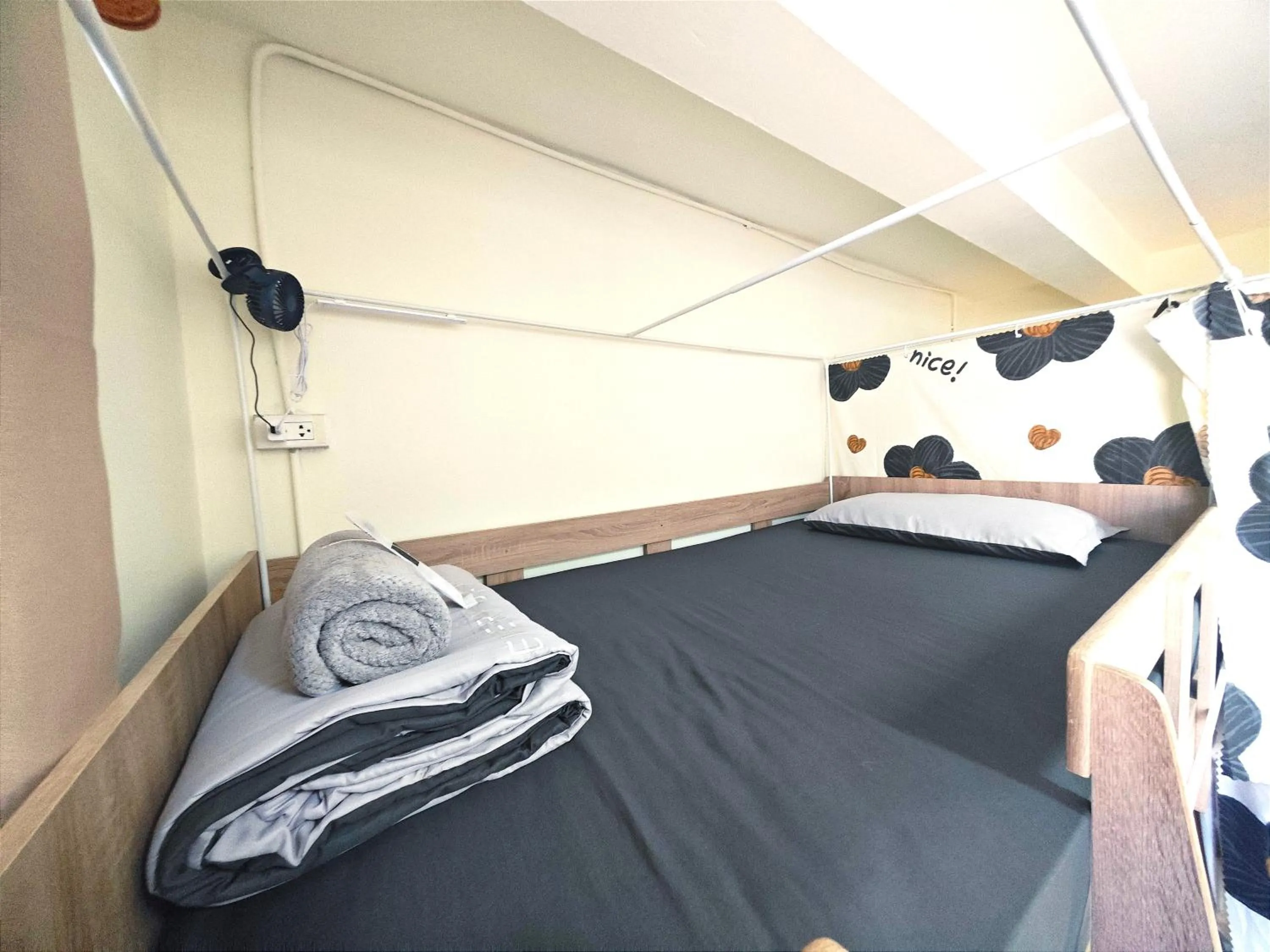 Bed in Panda Lodge Home Stay