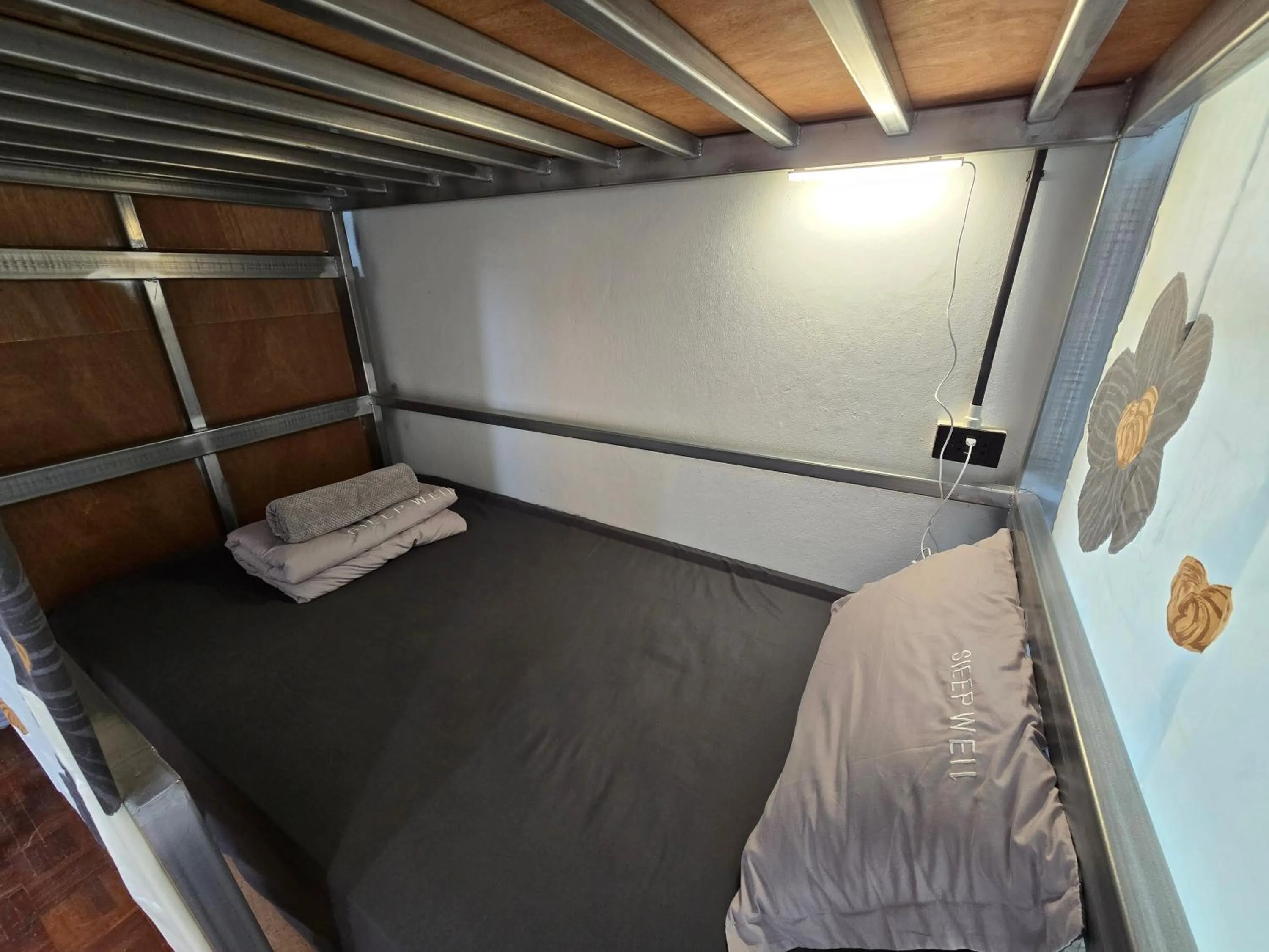 Bed in Panda Lodge Home Stay