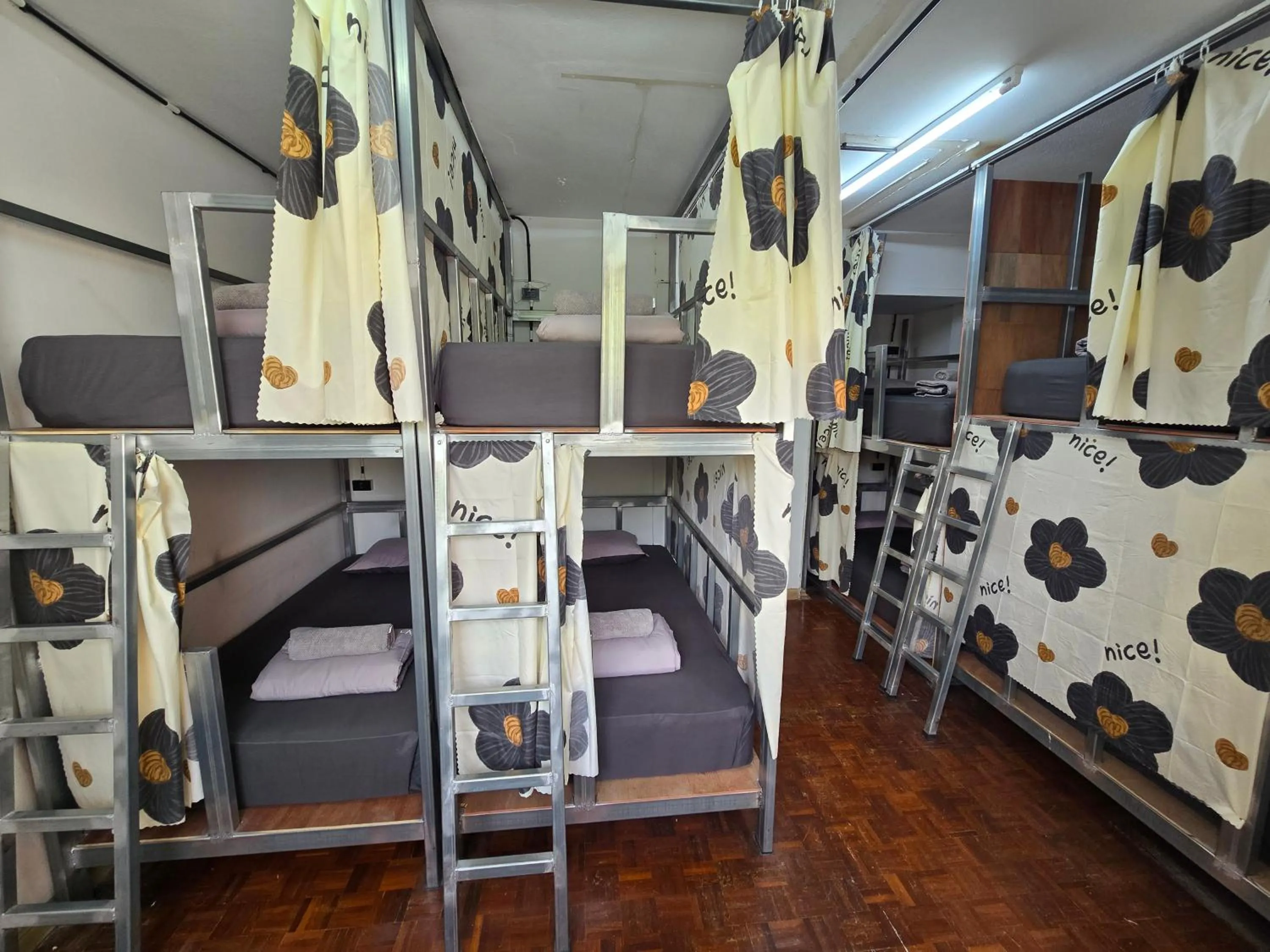 Bed in Panda Lodge Home Stay