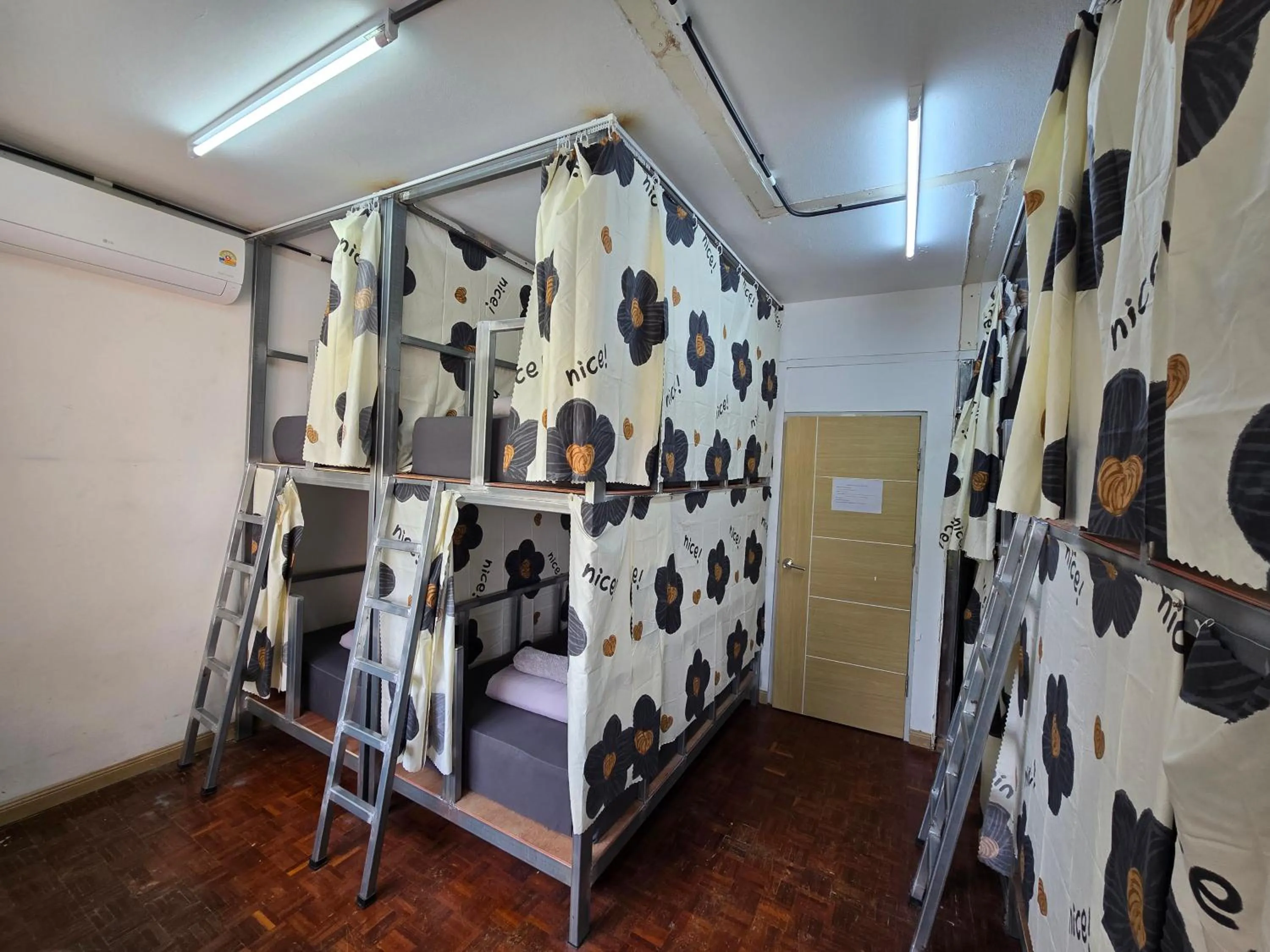 Bed in Panda Lodge Home Stay