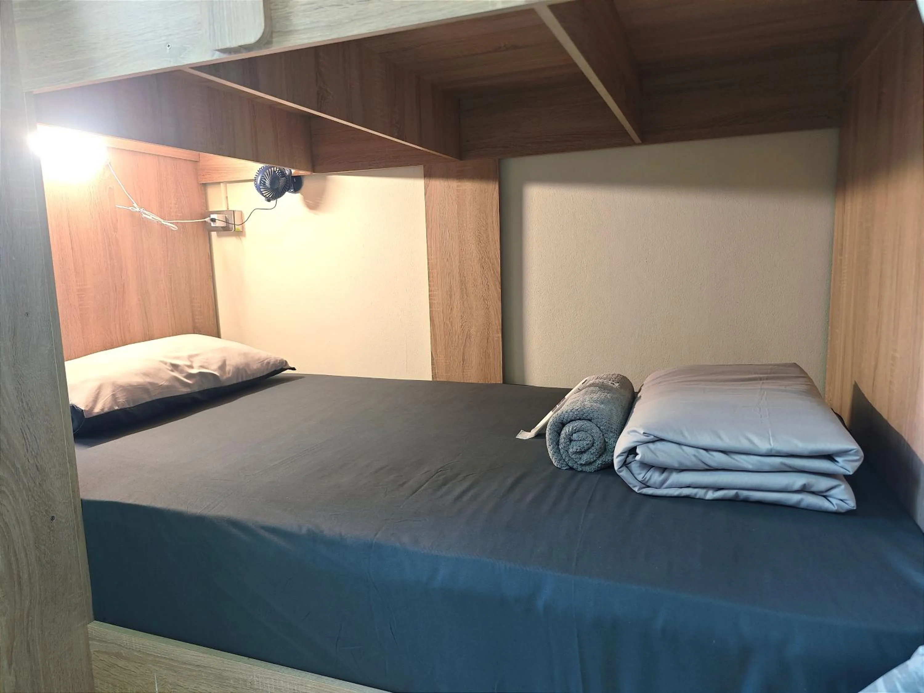 Bed in Panda Lodge Home Stay