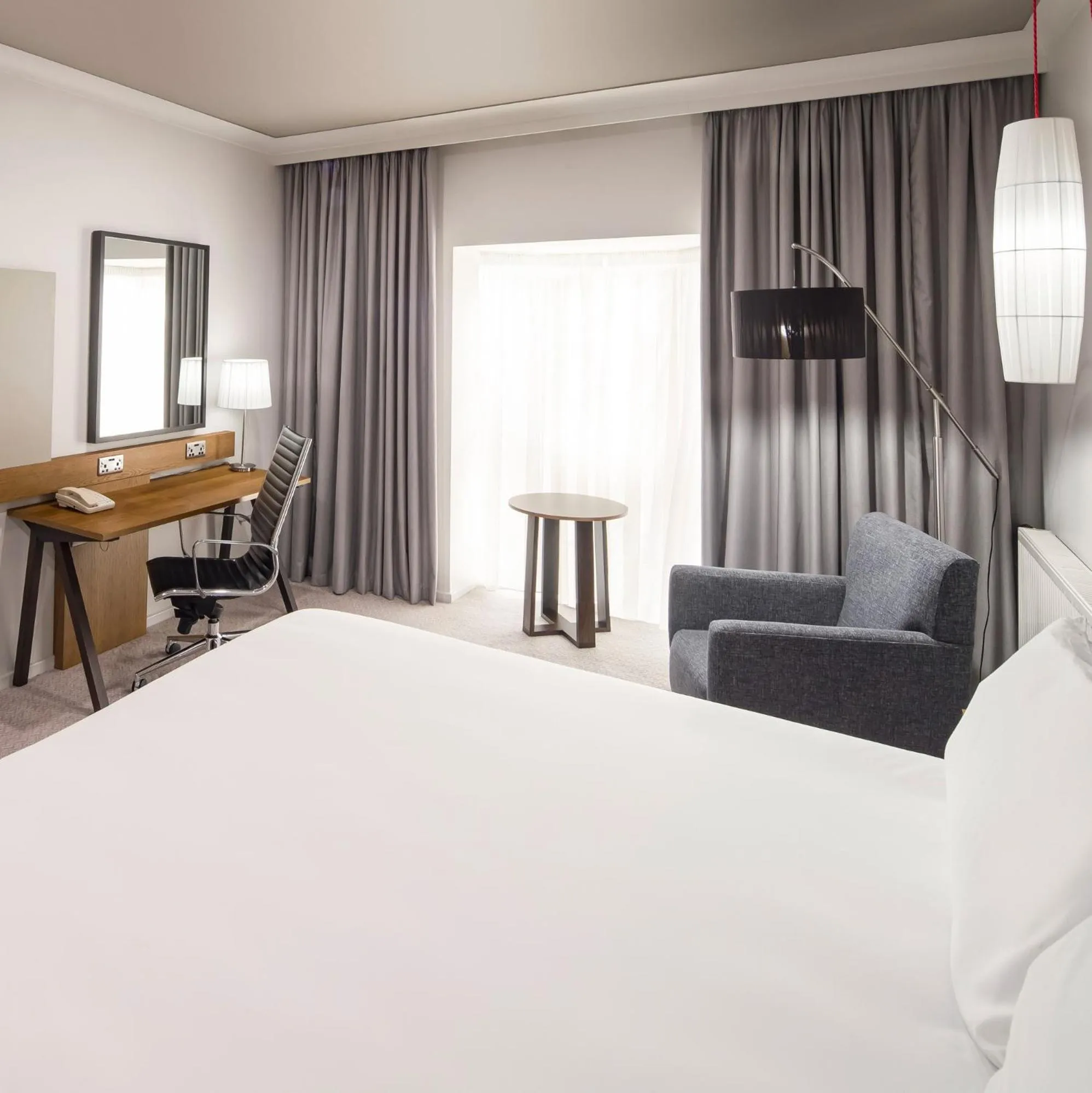 Seating area, Bed in Crowne Plaza Solihull by IHG