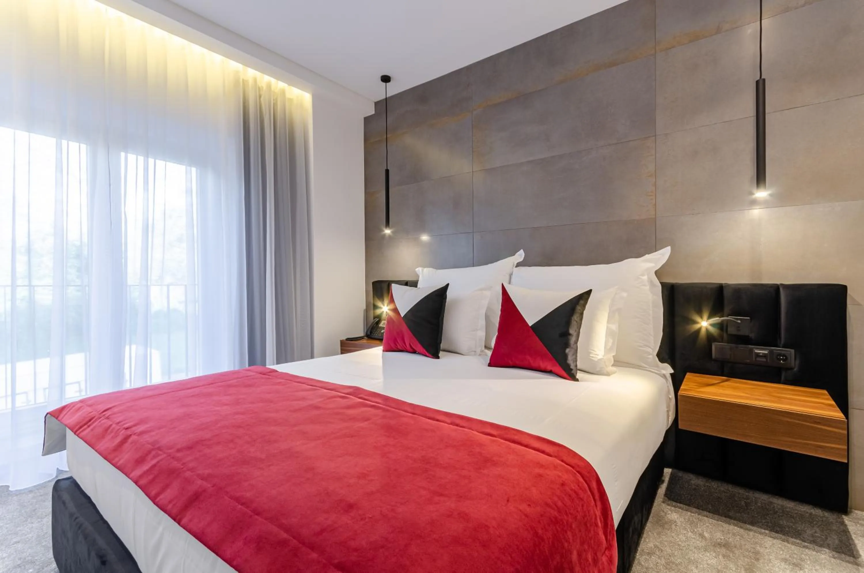 Bed in 2M BOUTIQUE HOTEL