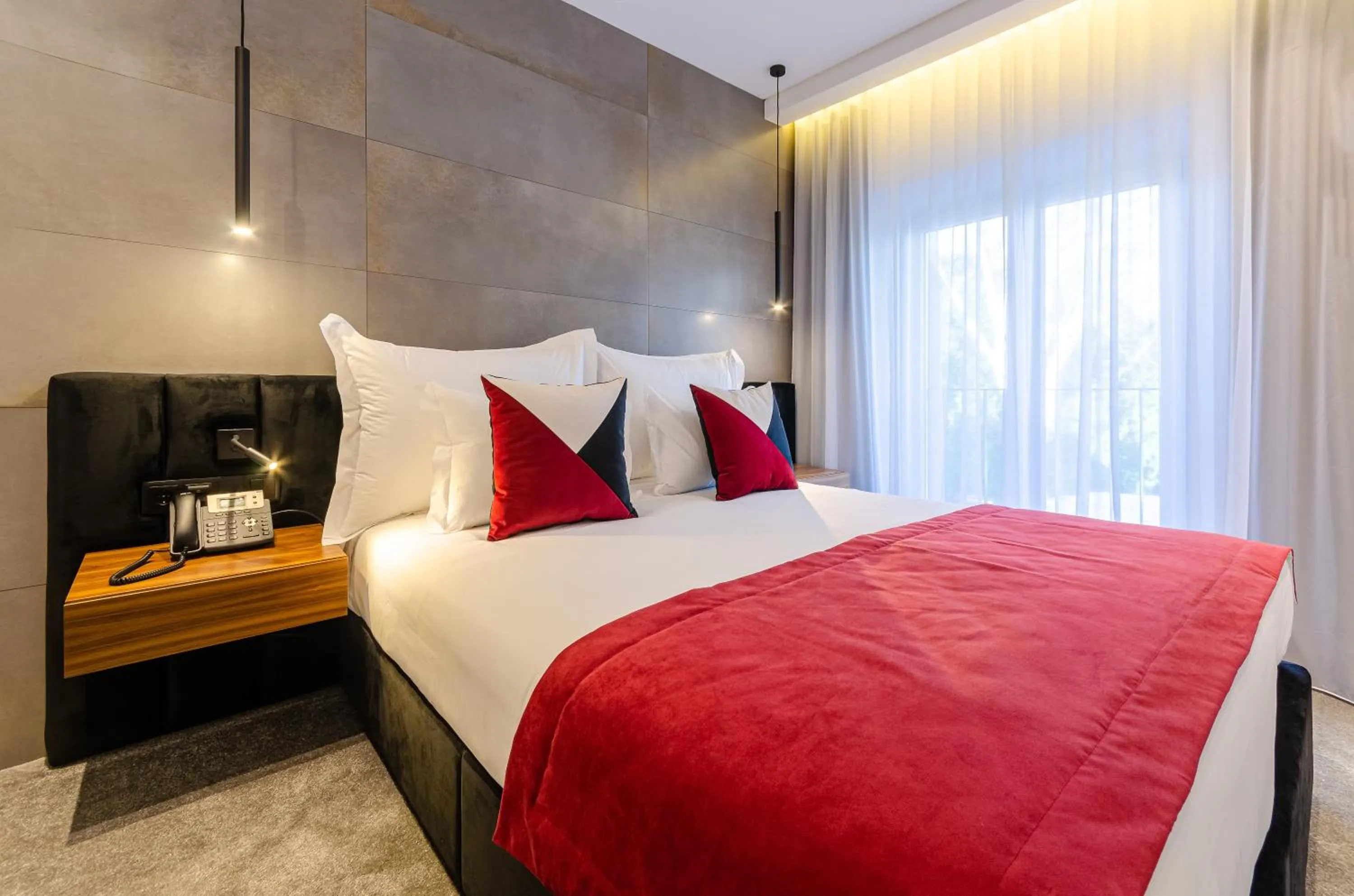 Bed in 2M BOUTIQUE HOTEL