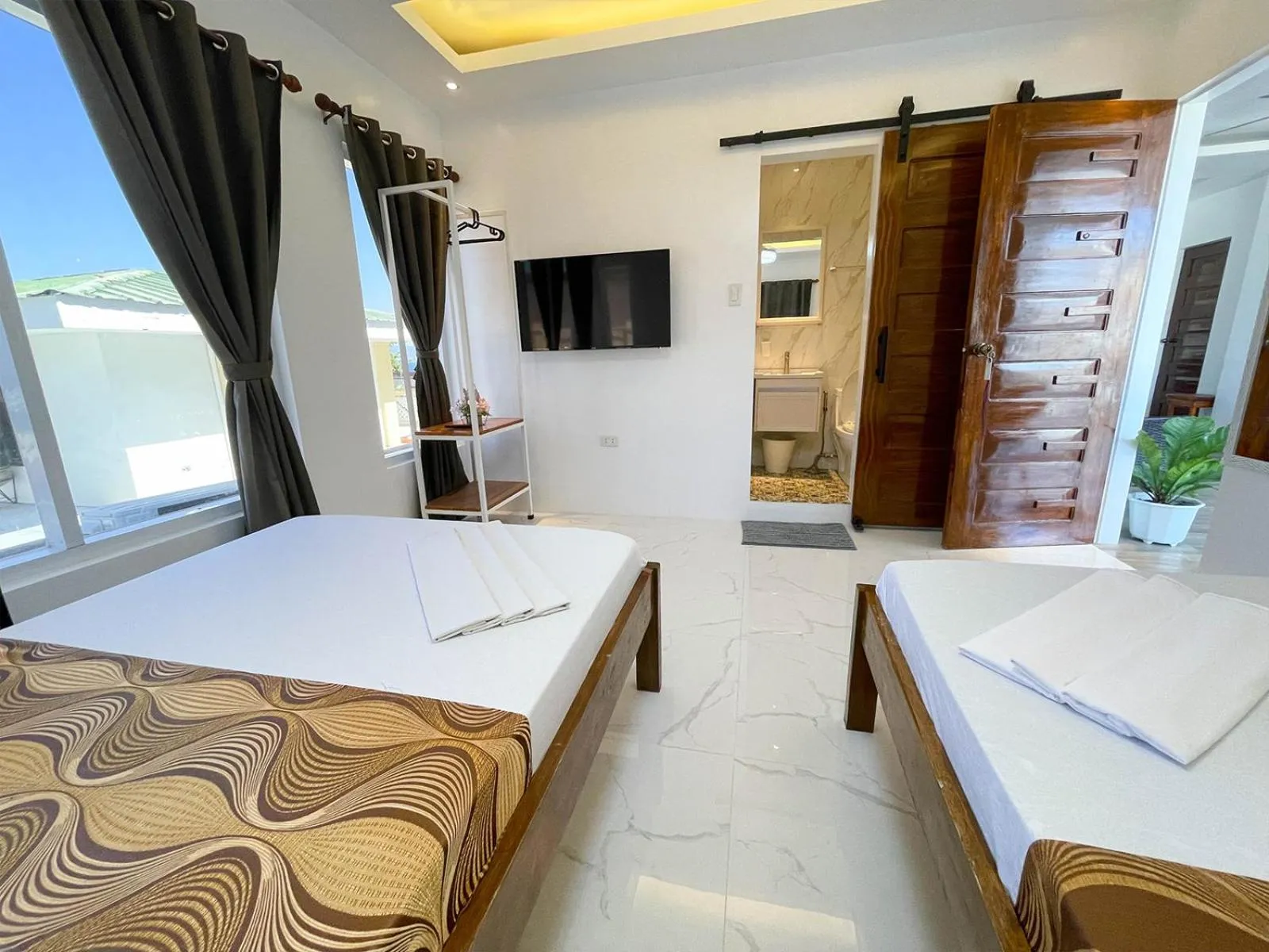 Bed in Agbing Seaside View Resort Puerto Galera powered by Cocotel