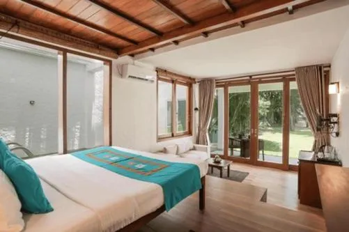 Bed in Hibiscus Beach Hotel & Villas