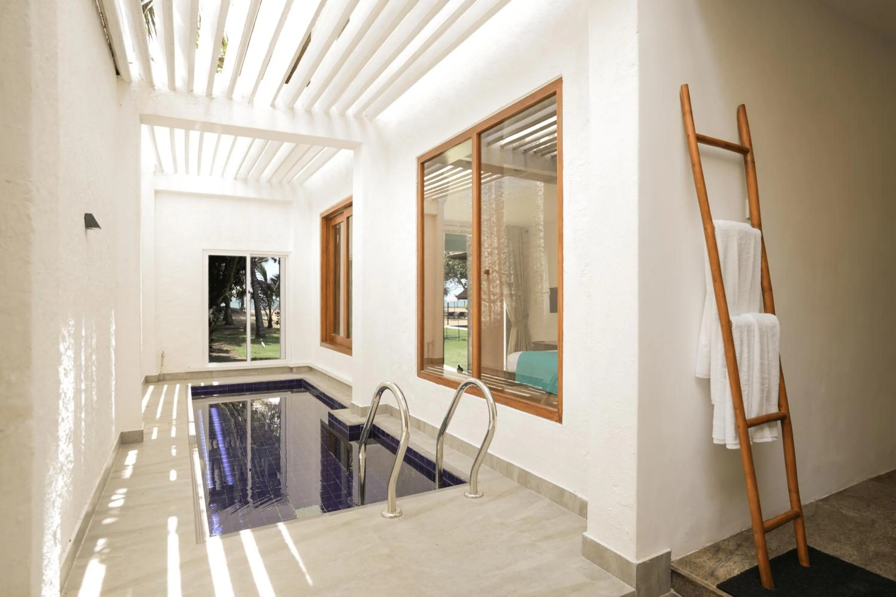 Pool view in Hibiscus Beach Hotel & Villas