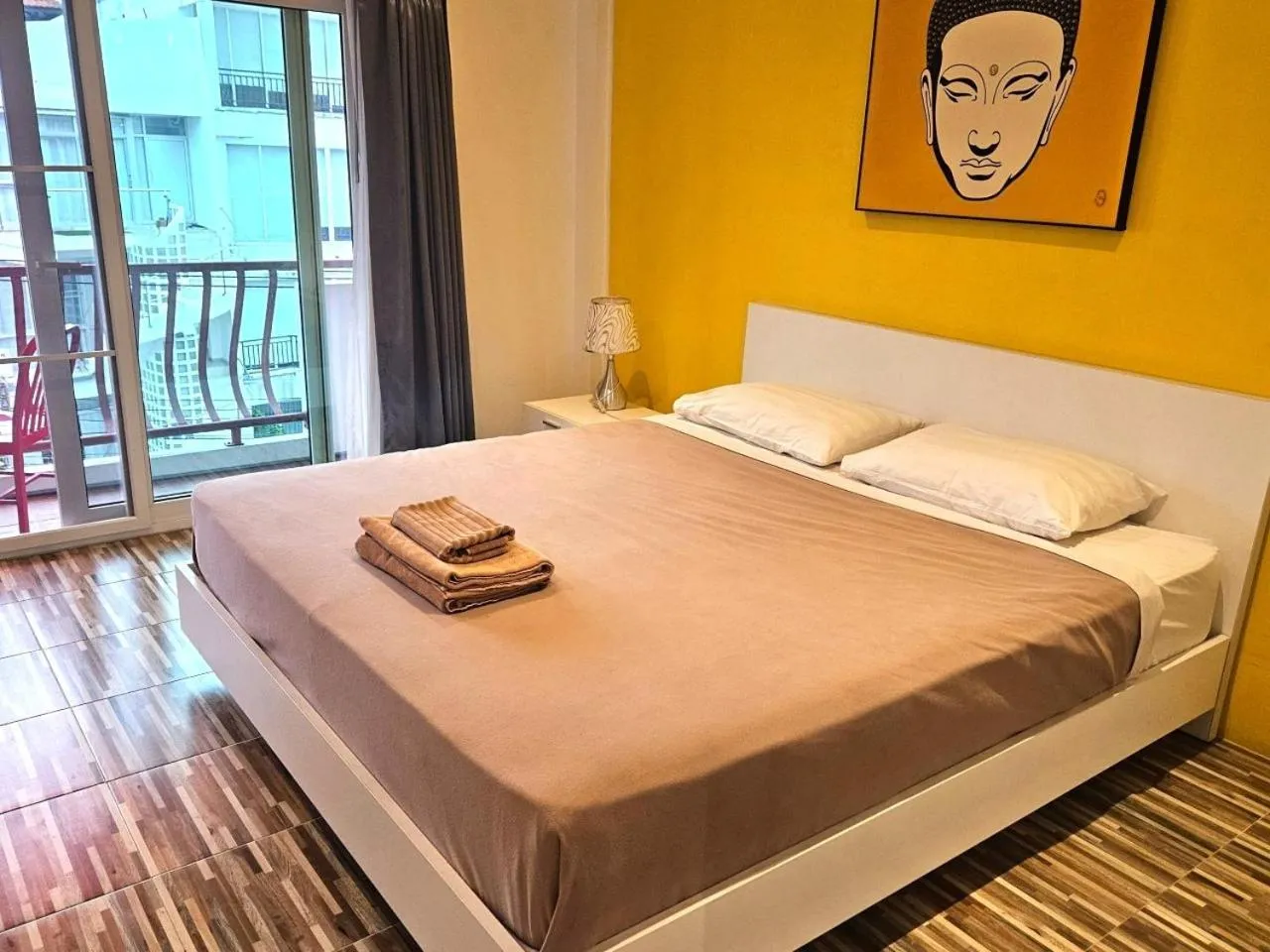 Bed in Al Fiore Guesthouse Pattaya