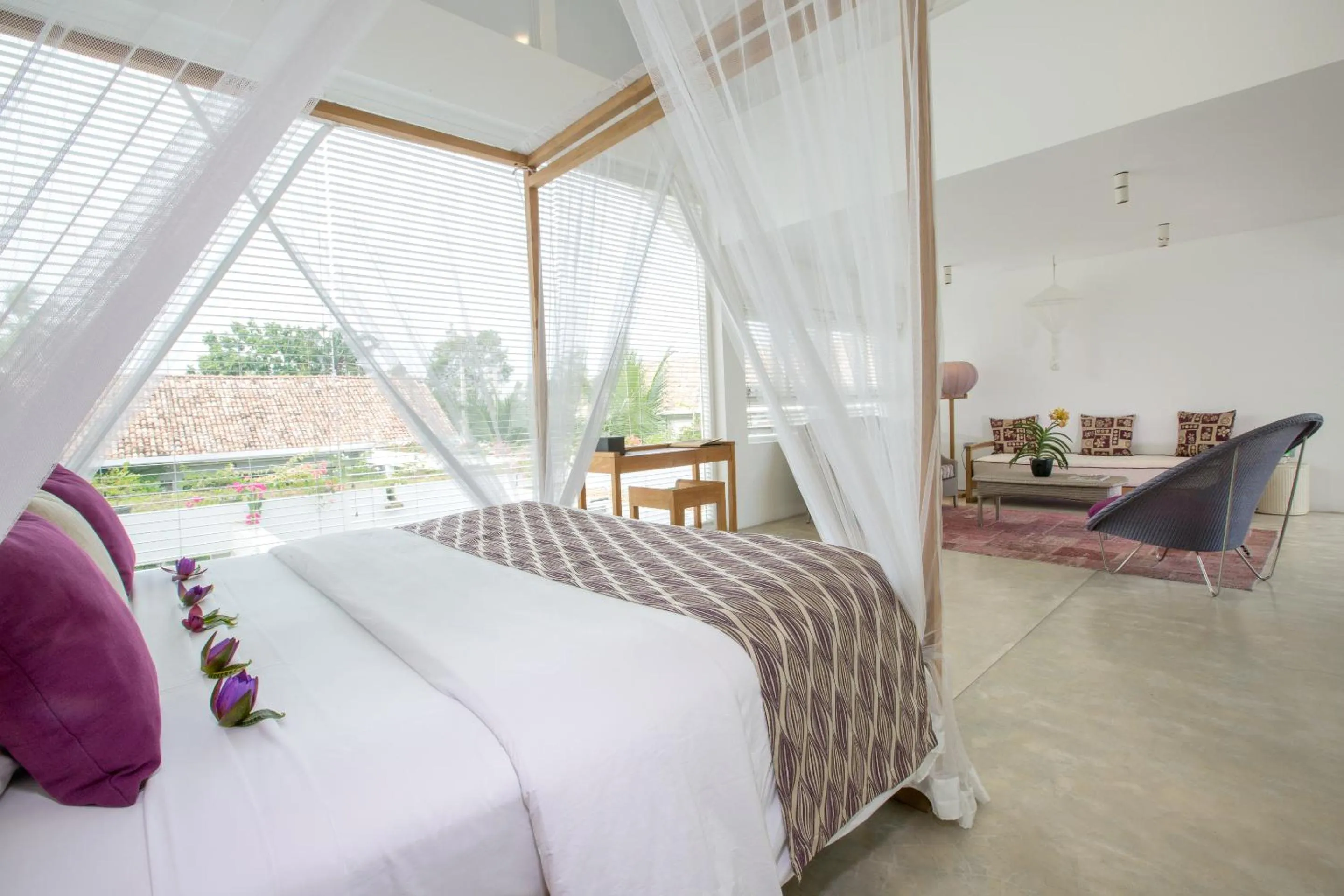Bed in Sri Sharavi Beach Villas & Spa - with 43 metre saltwater infinity pool