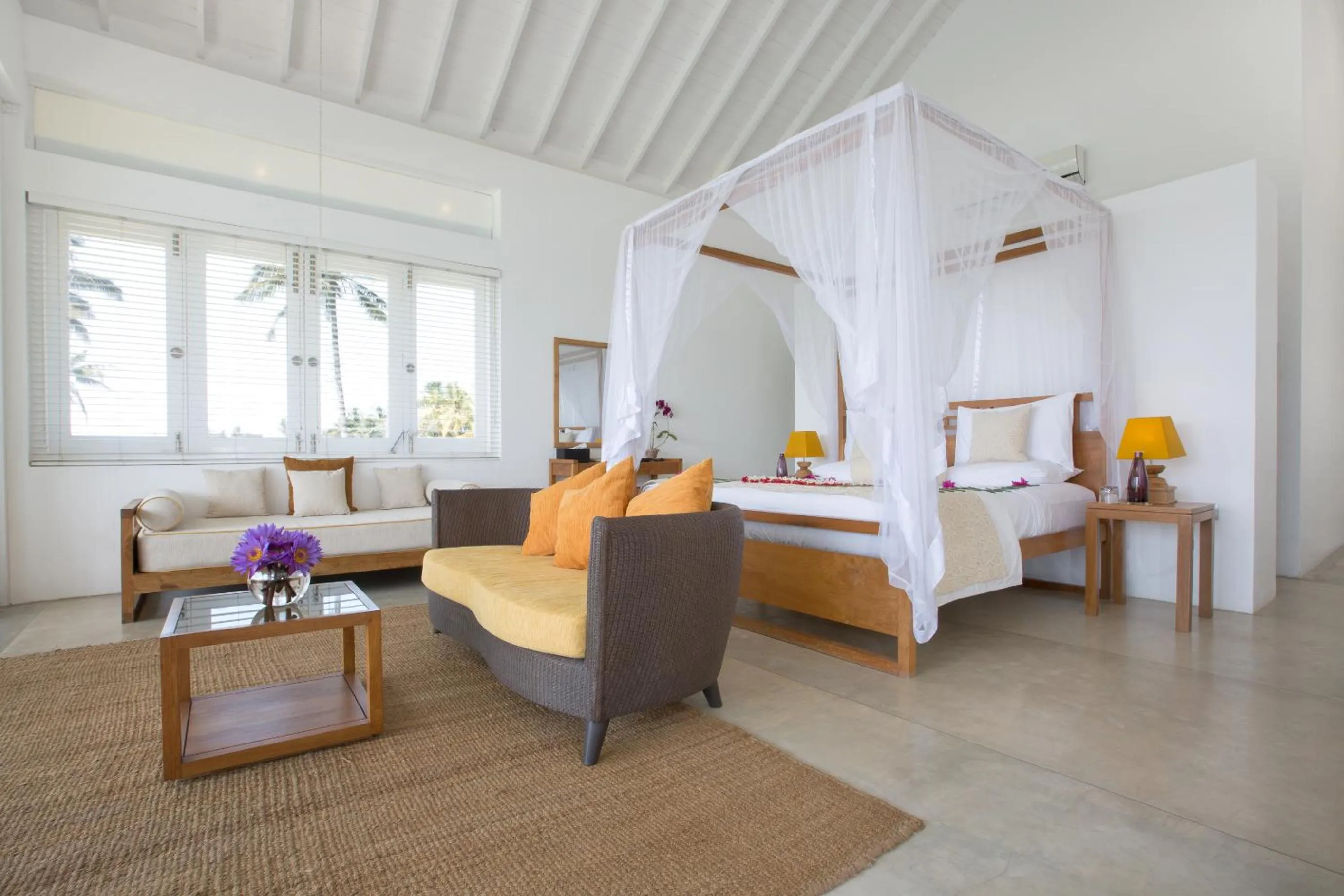 Bed in Sri Sharavi Beach Villas & Spa - with 43 metre saltwater infinity pool