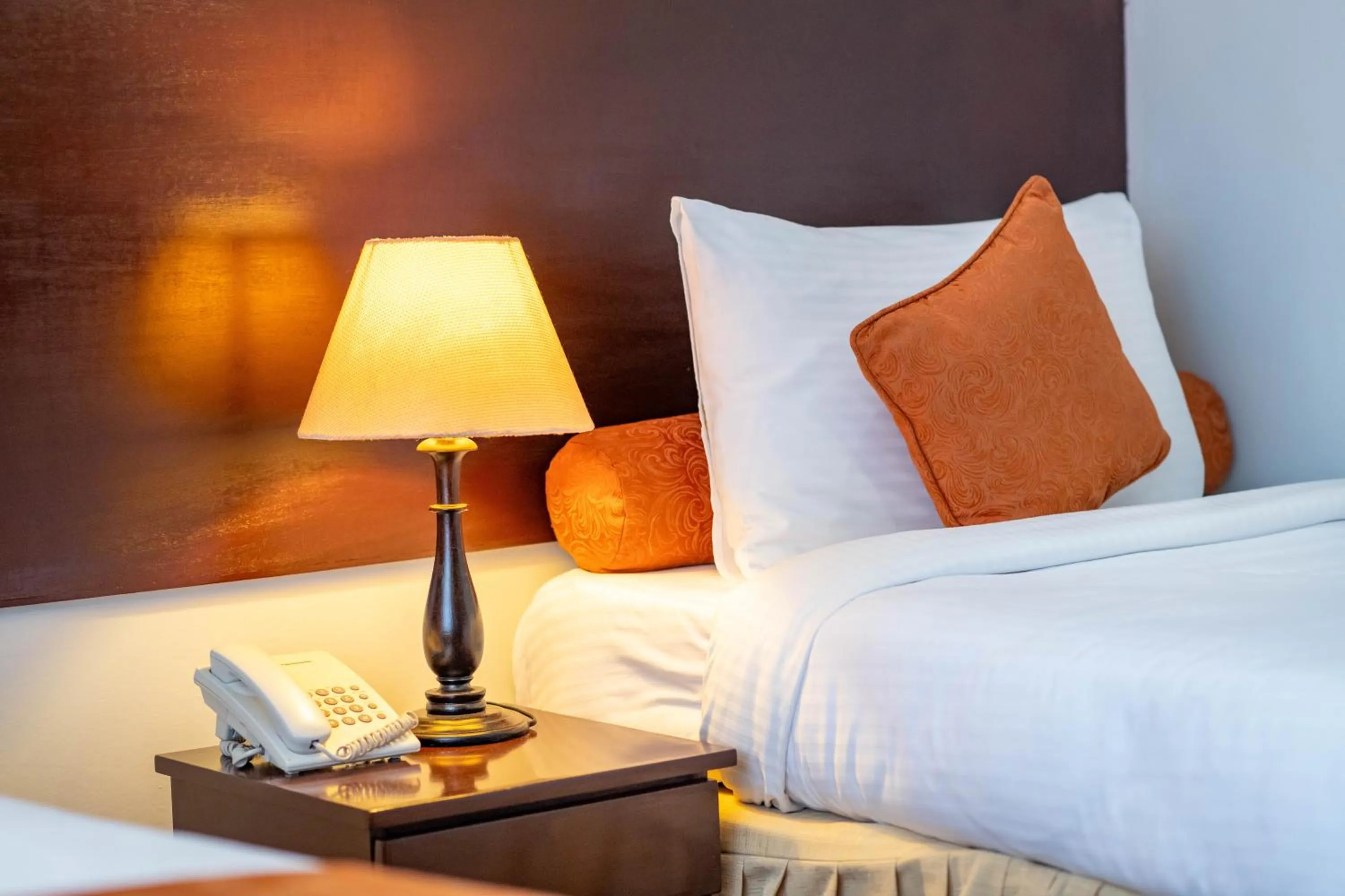 Bedroom in The Monarch Hotel