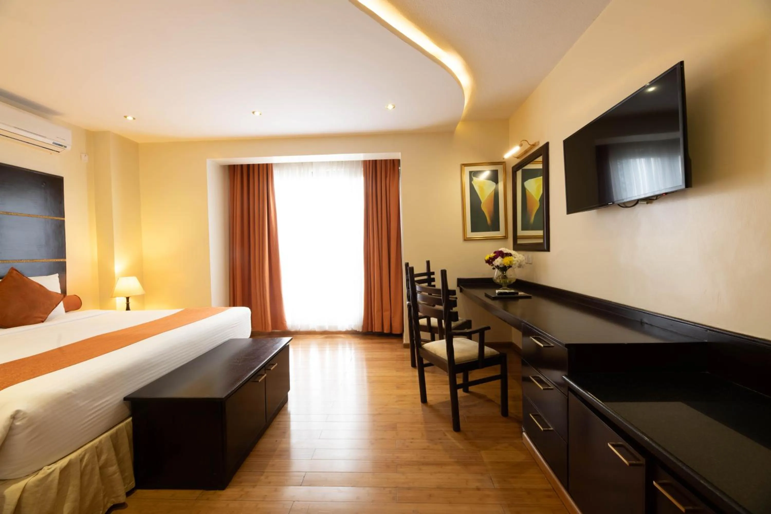 Bedroom in The Monarch Hotel