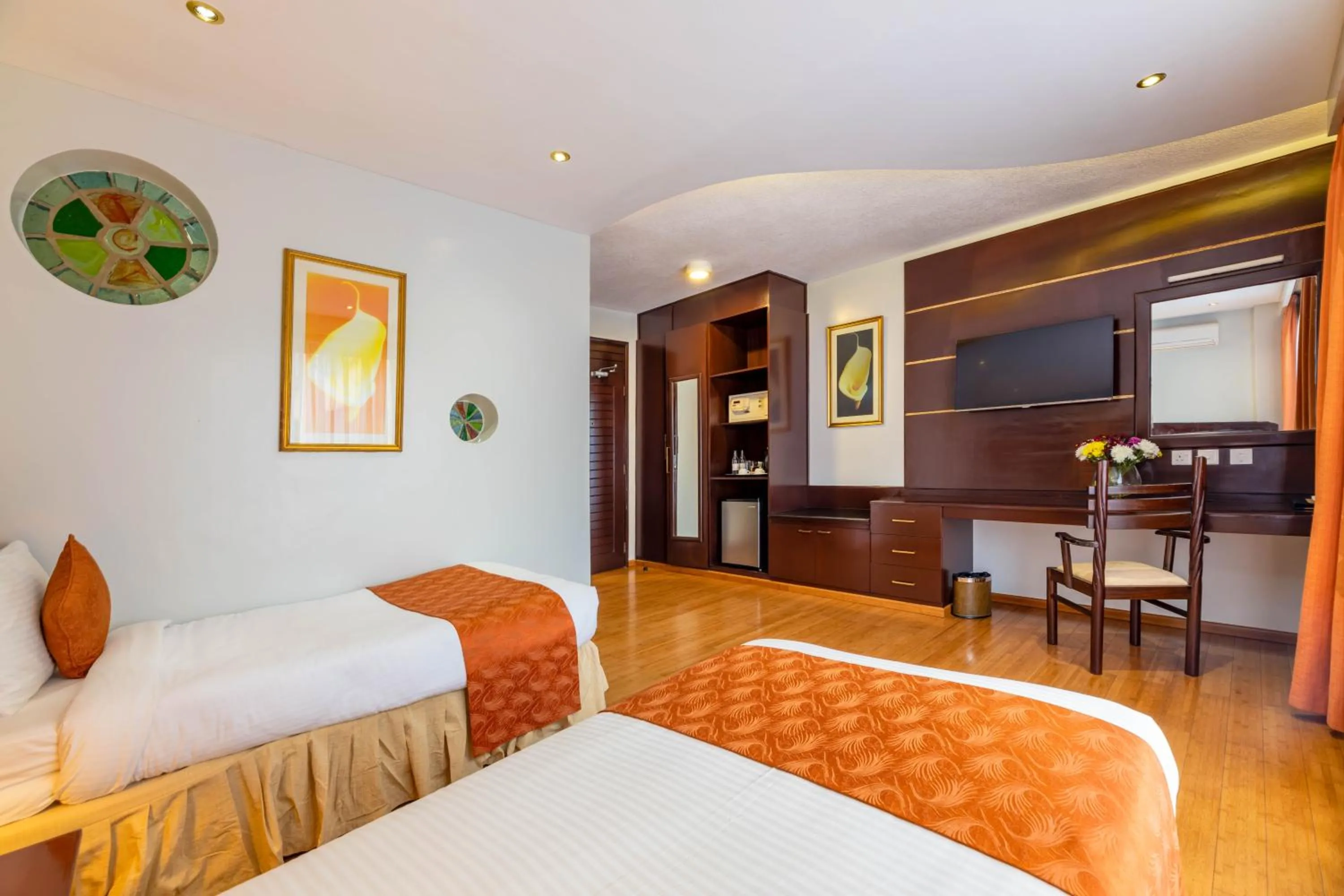 Bedroom in The Monarch Hotel