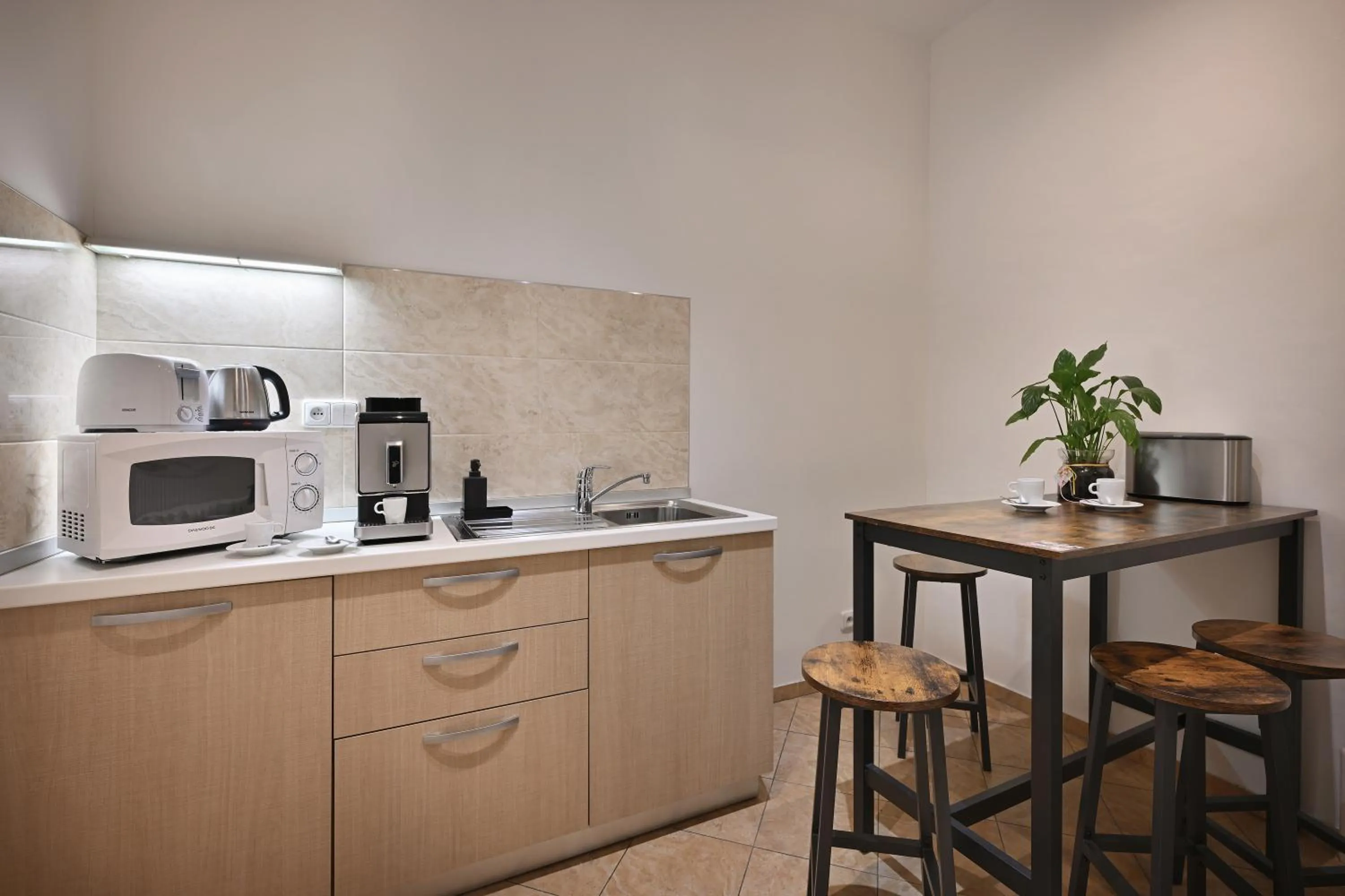 Seating area in Boutique Residence by Little King