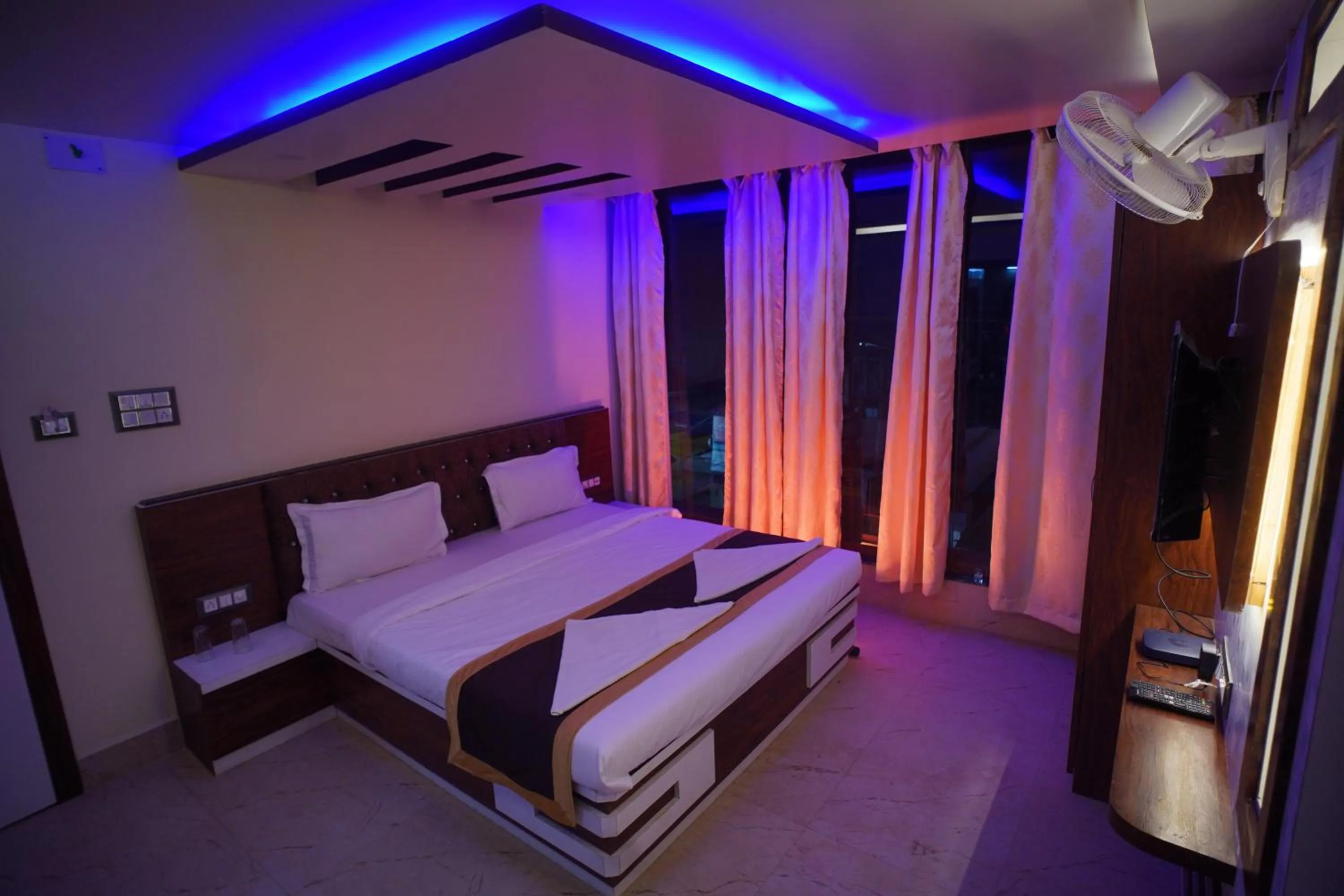 Photo of the whole room in Hotel Asha Inn