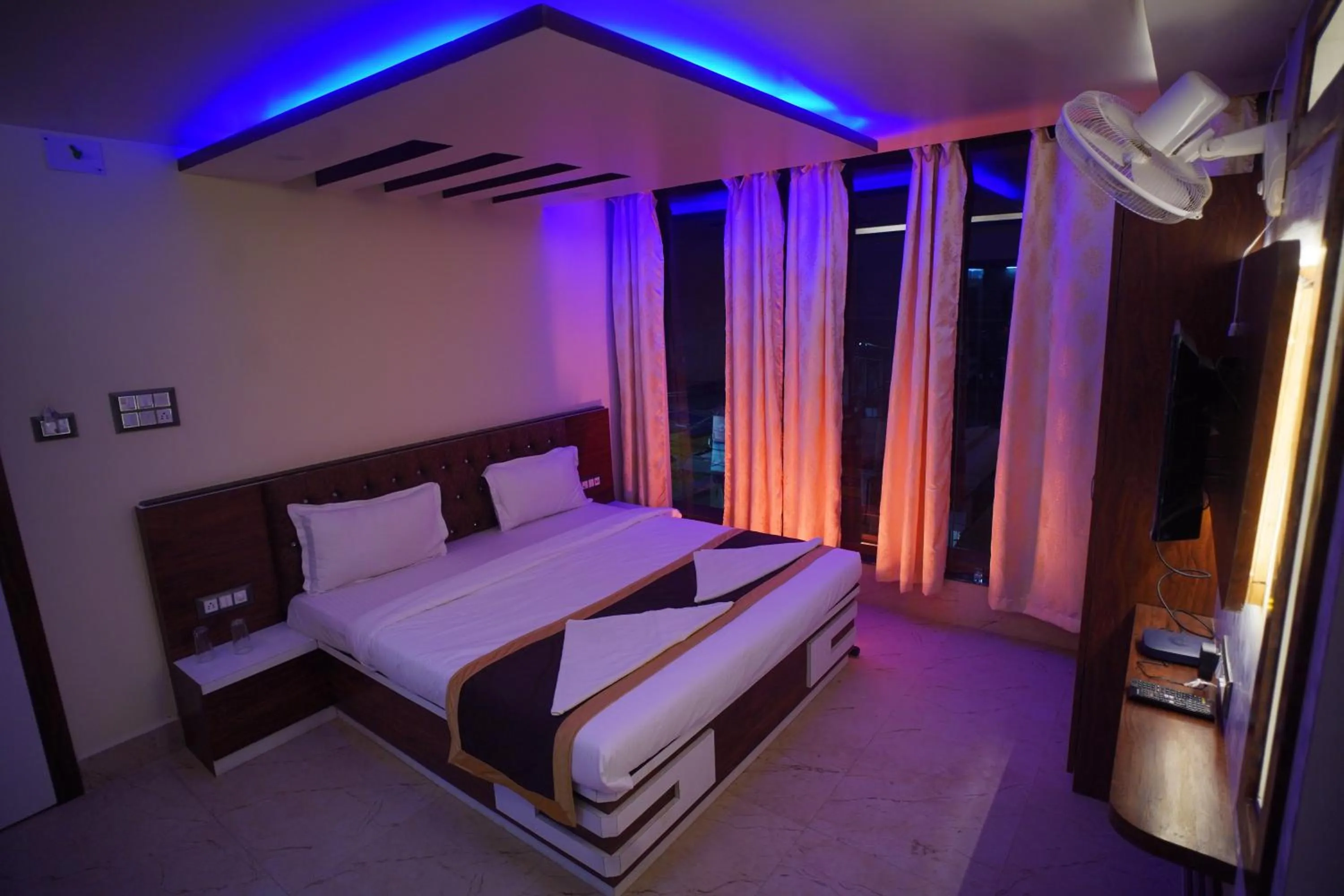 Bedroom in Hotel Asha Inn