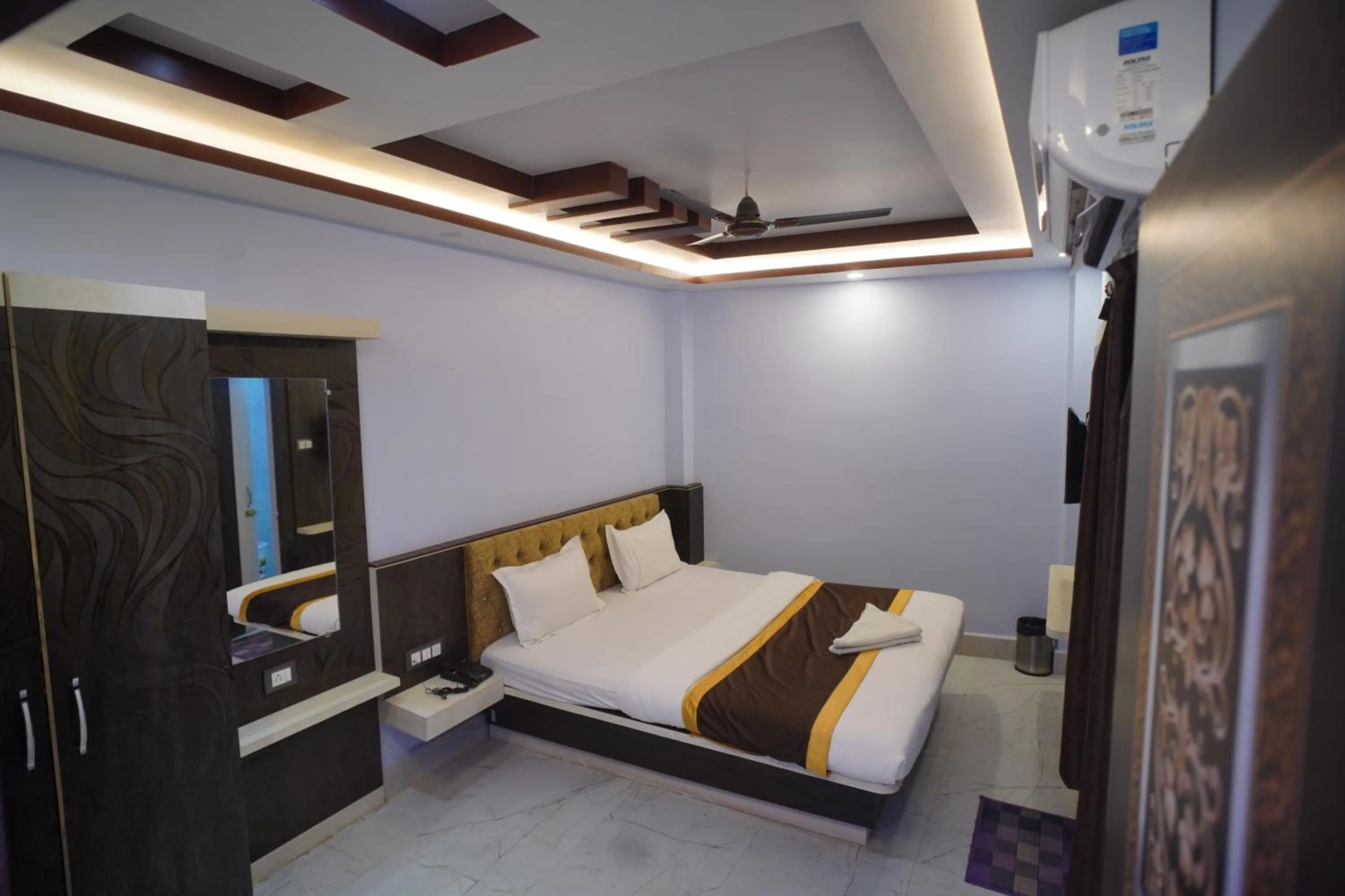 Bedroom in Hotel Asha Inn