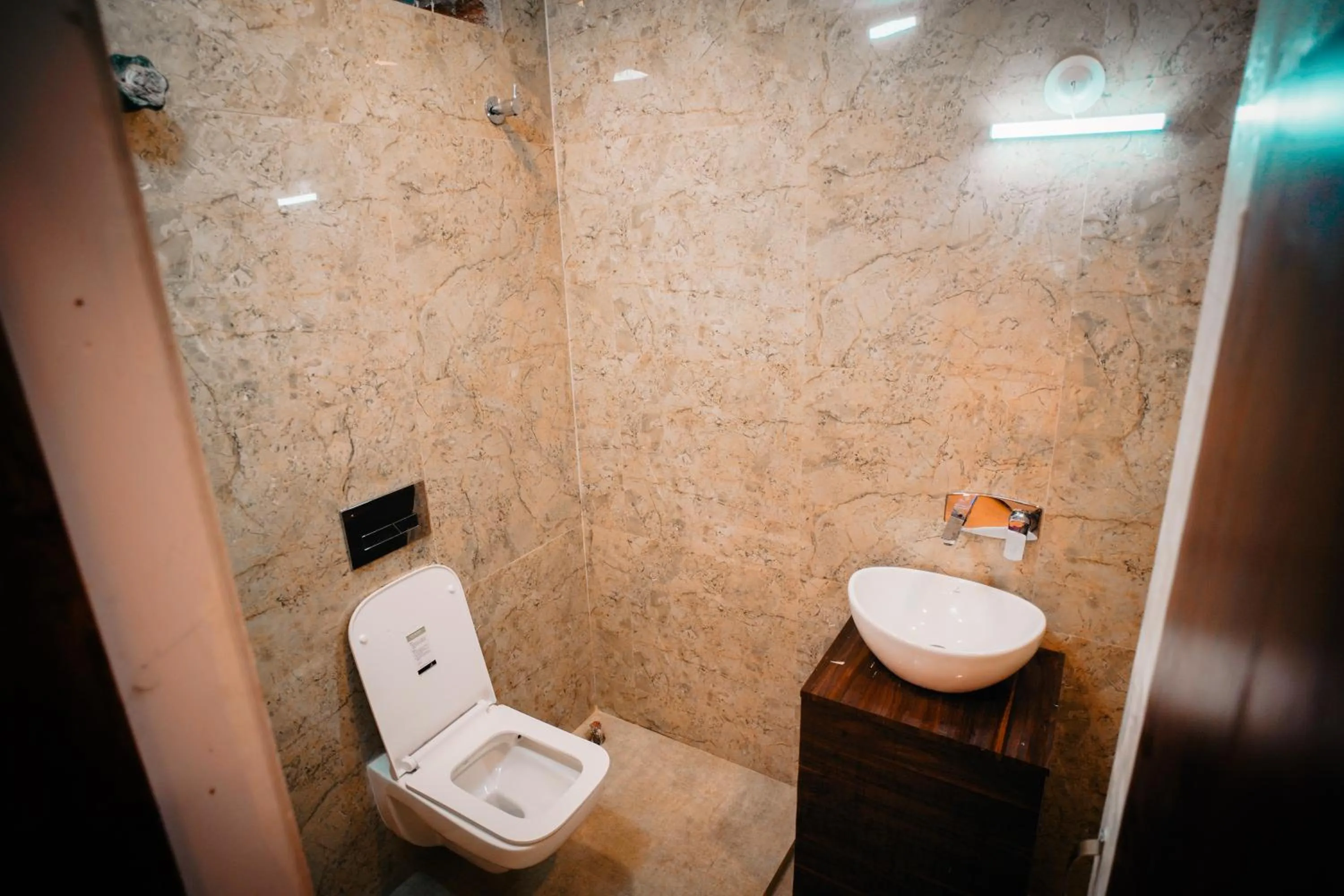 Bathroom in Hotel Asha Inn