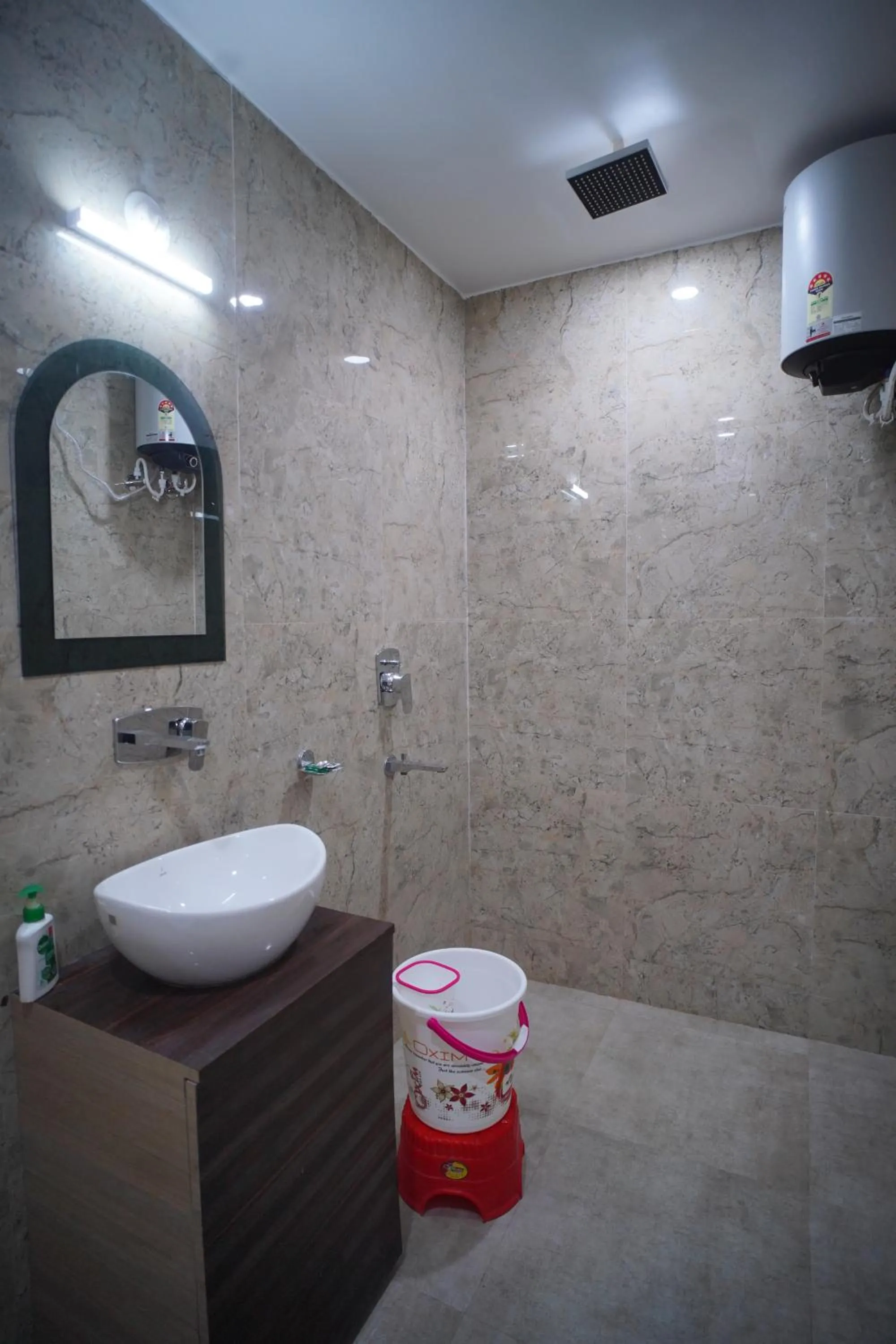 Bathroom in Hotel Asha Inn