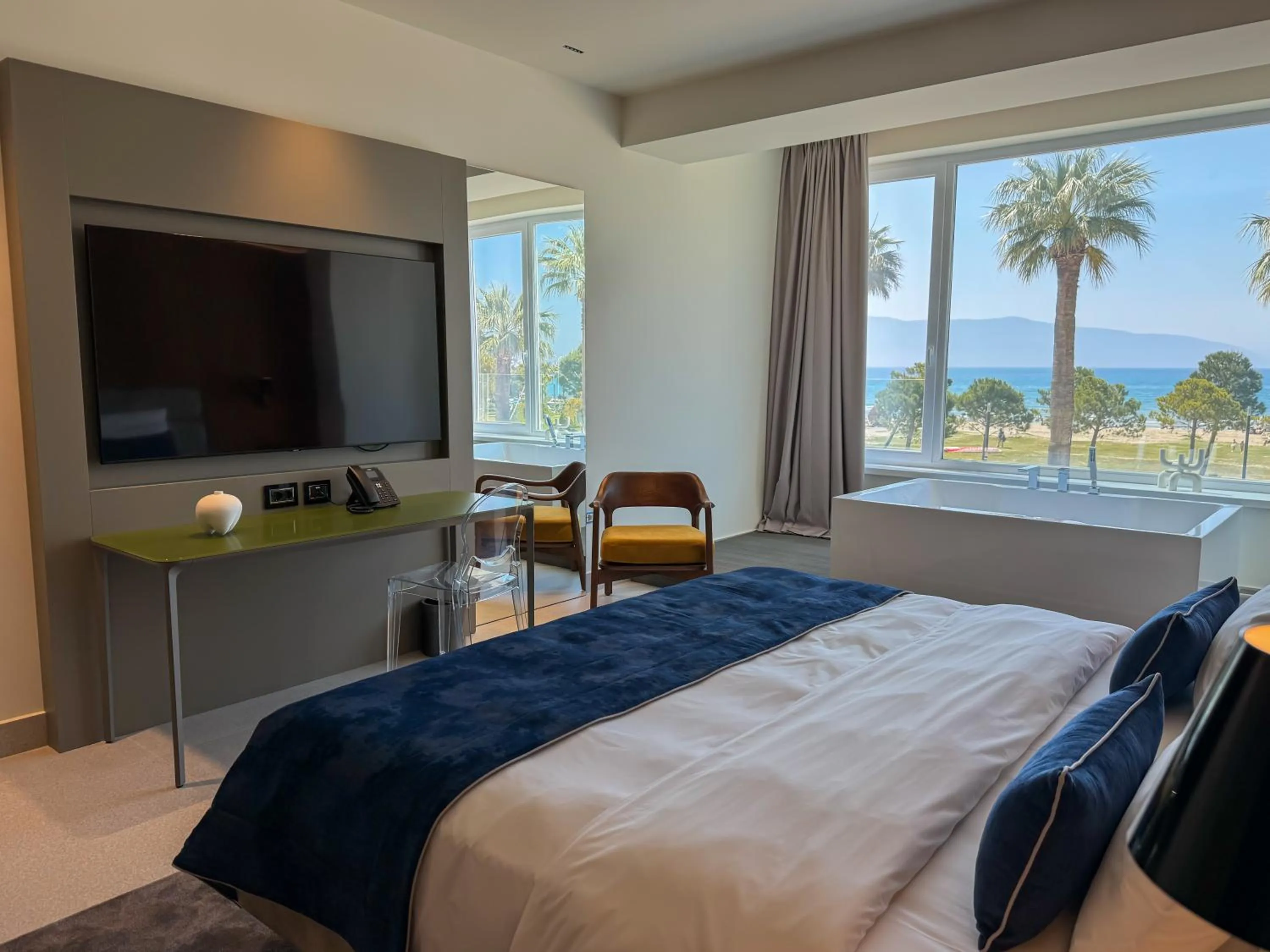 Communal lounge/ TV room, Bed in Abi's Hotel & SPA Vlore