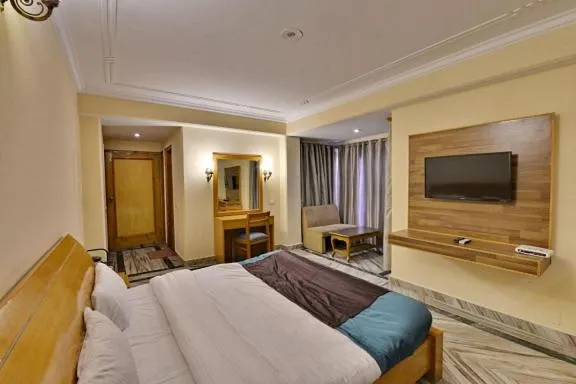 Photo of the whole room, Bed in The Woodstock Resort