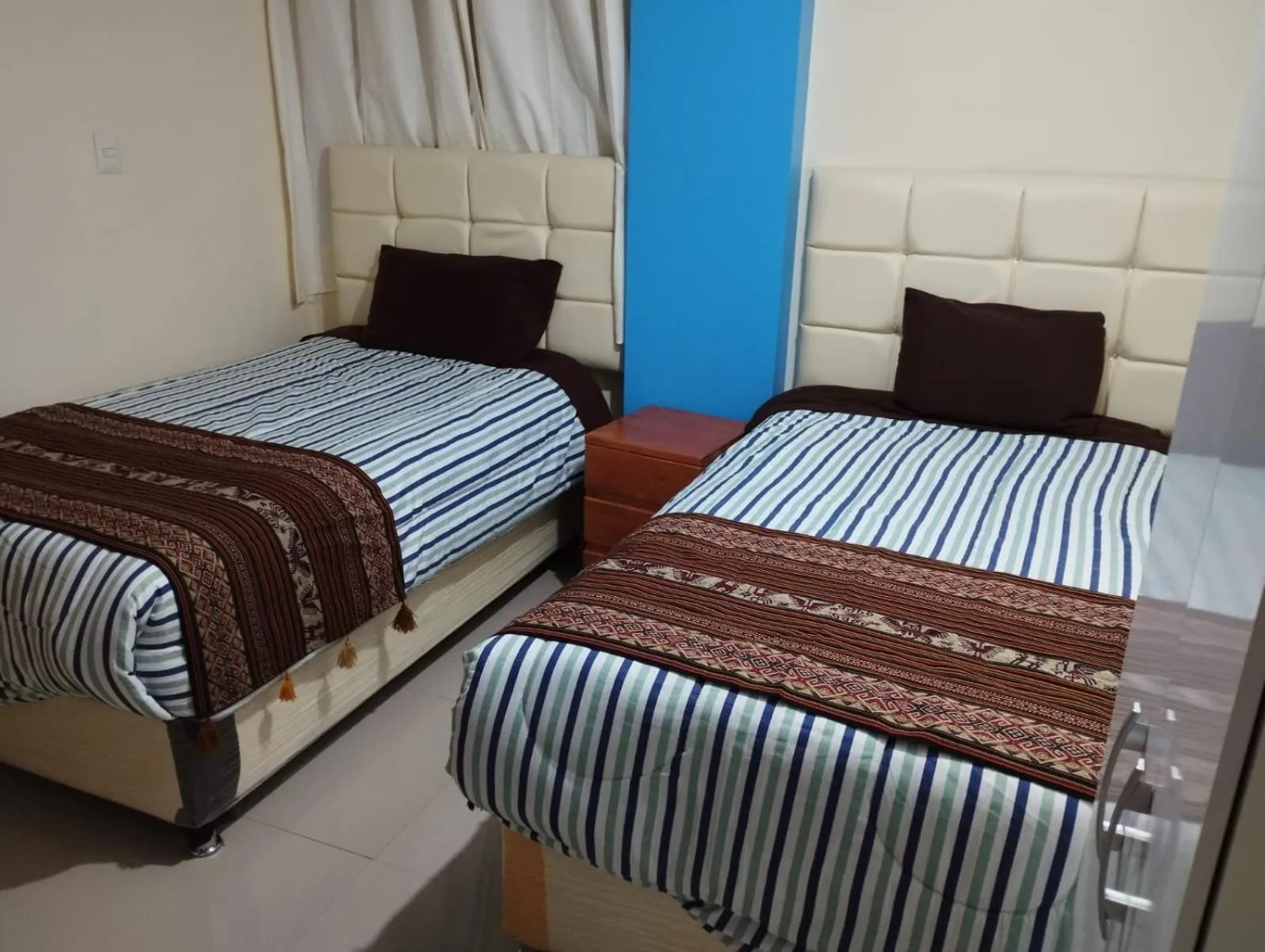 Bed in hotel plaza chinchero