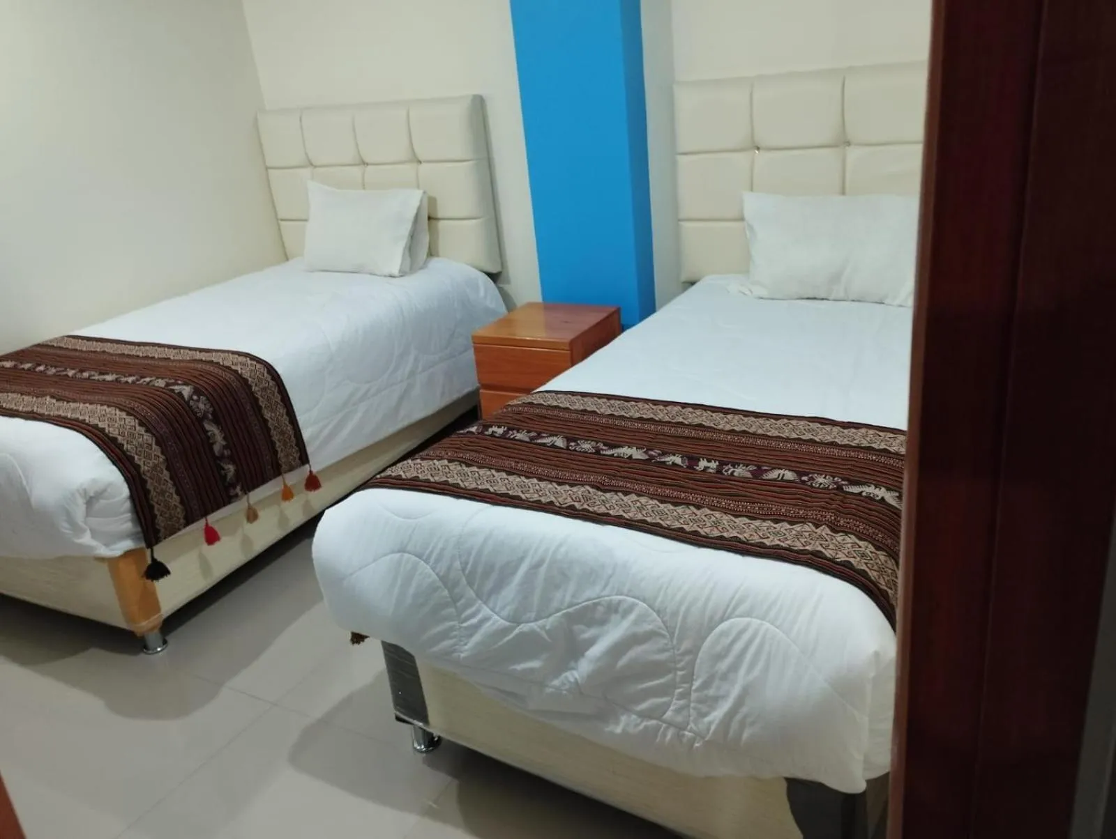 Bed in hotel plaza chinchero