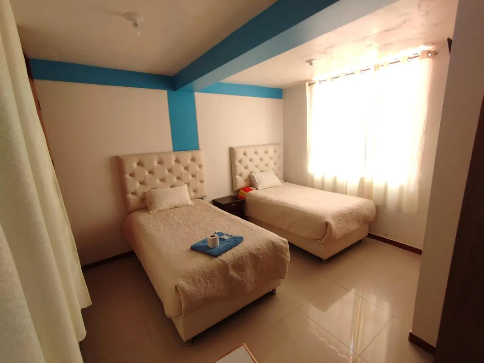 Bed in hotel plaza chinchero