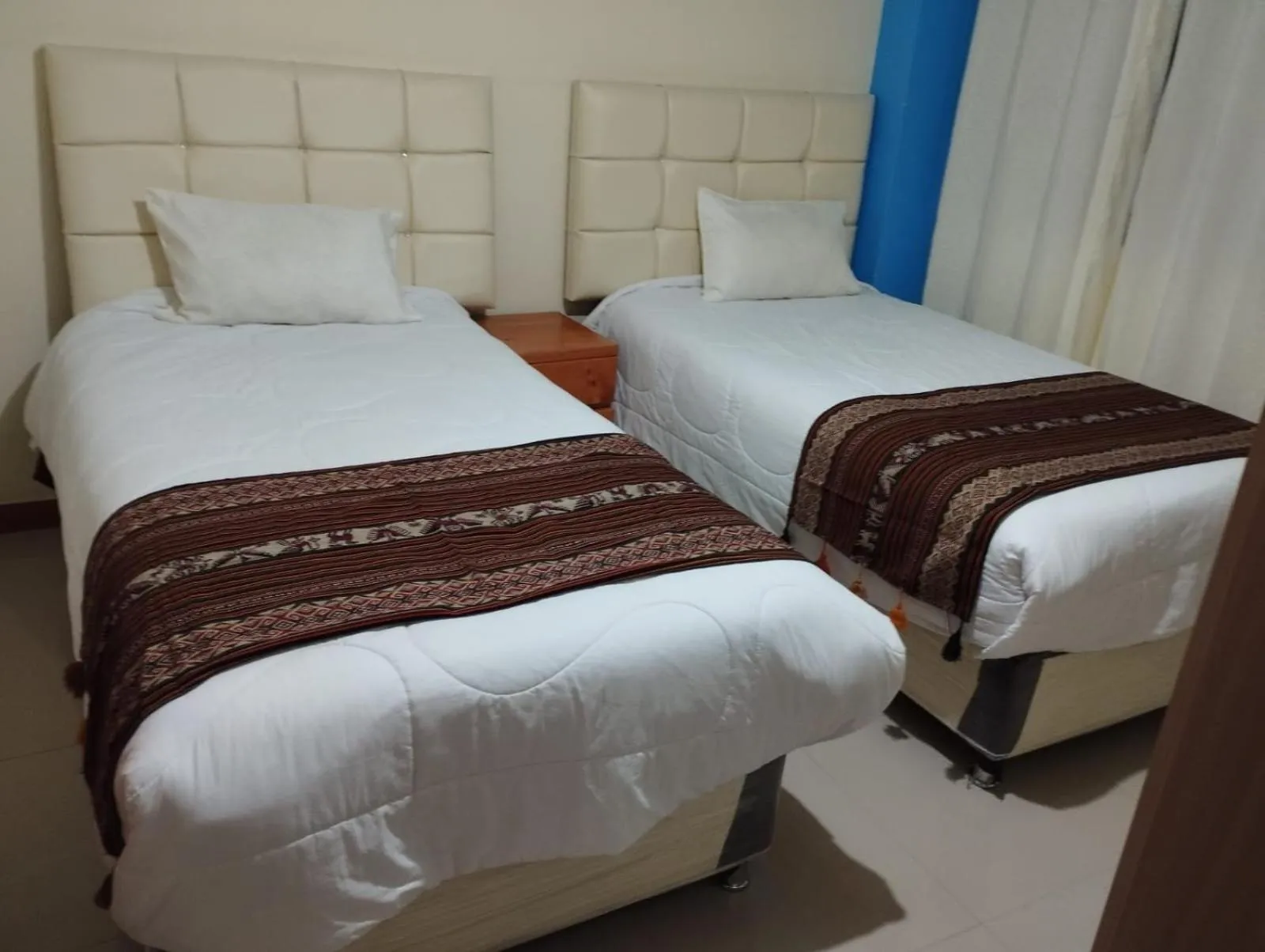 Bed in hotel plaza chinchero