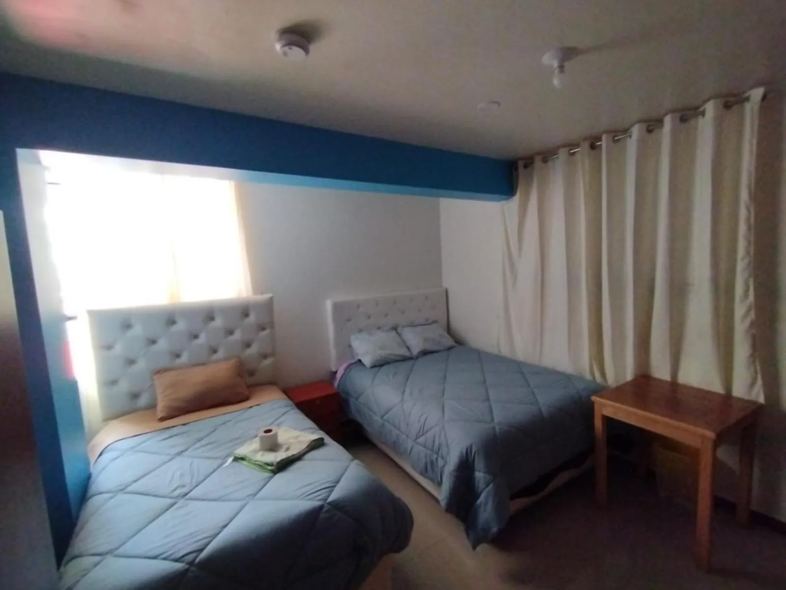 Bed in hotel plaza chinchero