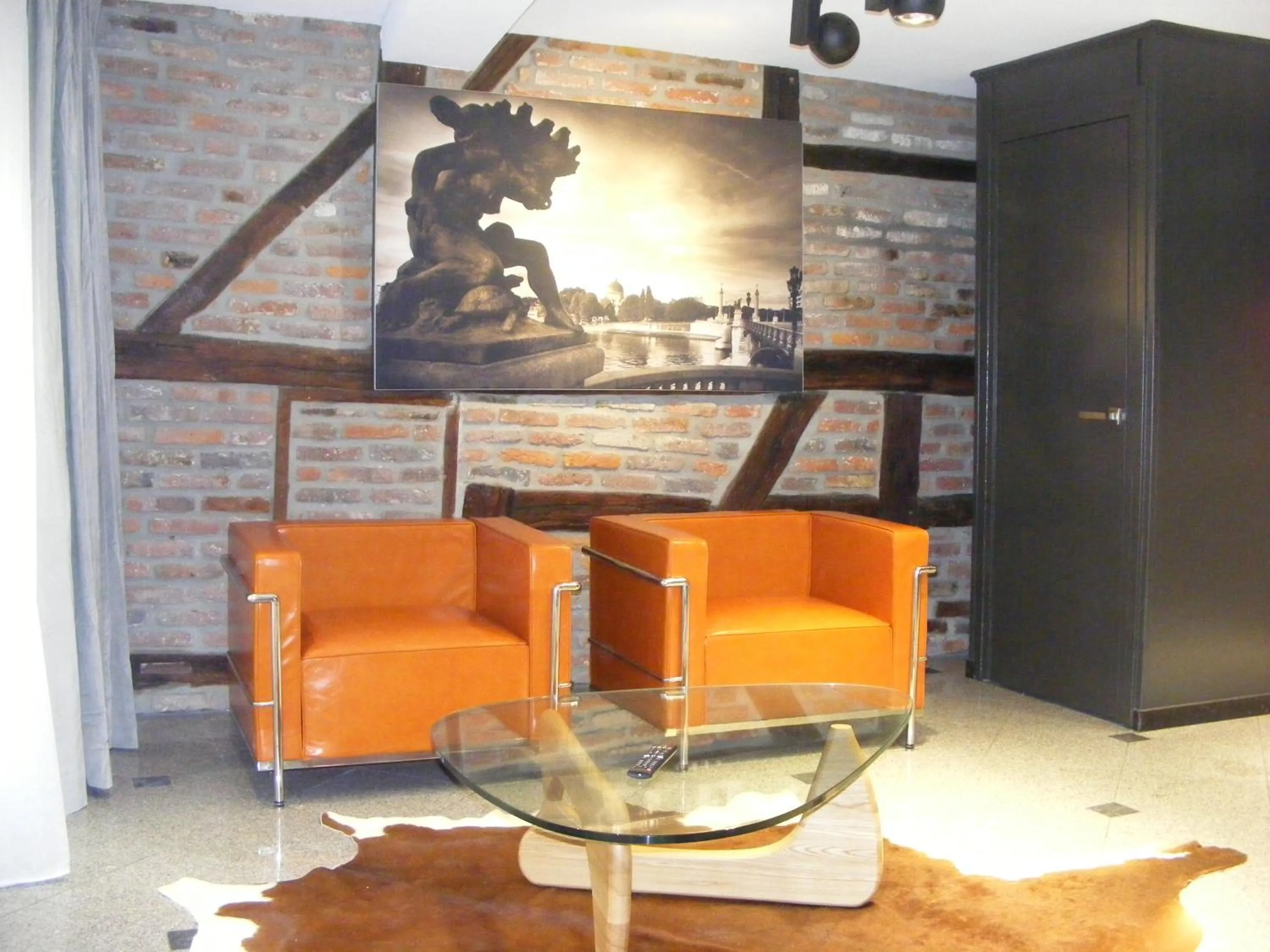Seating area in Amosa Liège City Centre Hotel