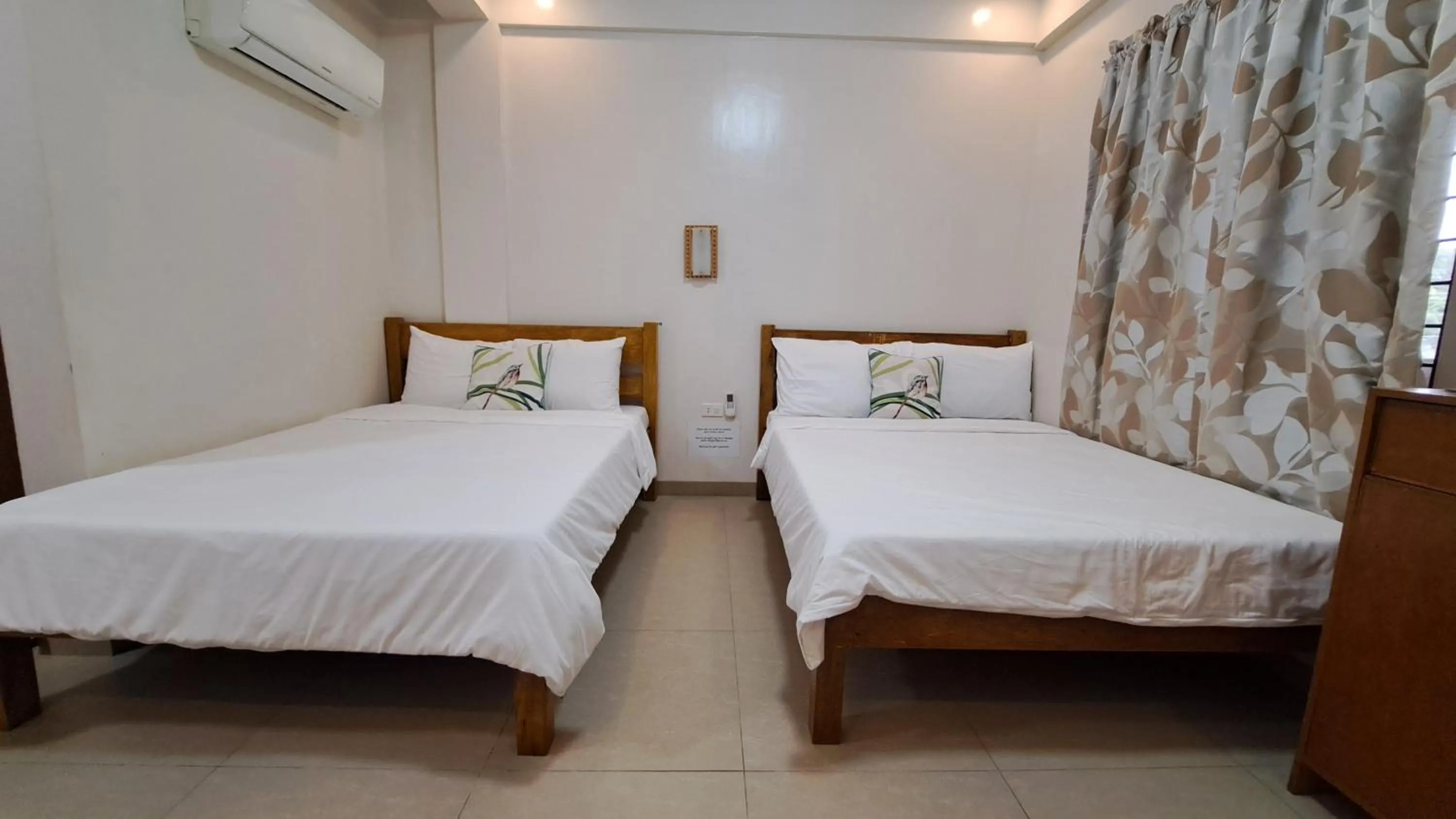 Bed in Villa Pamana Inn Puerto Galera powered by Cocotel