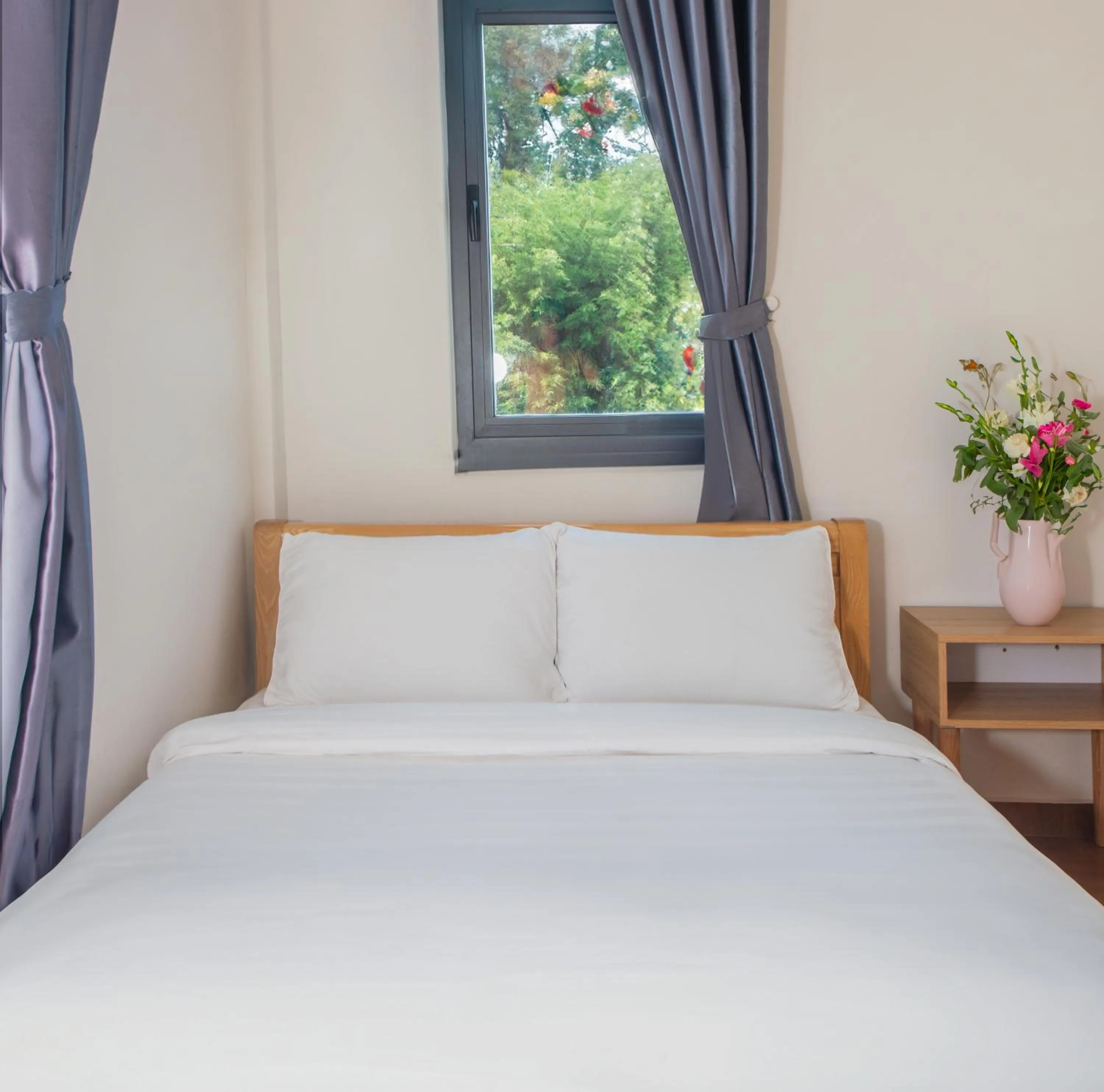 Bed in Nhý Villa Đà Lạt Review