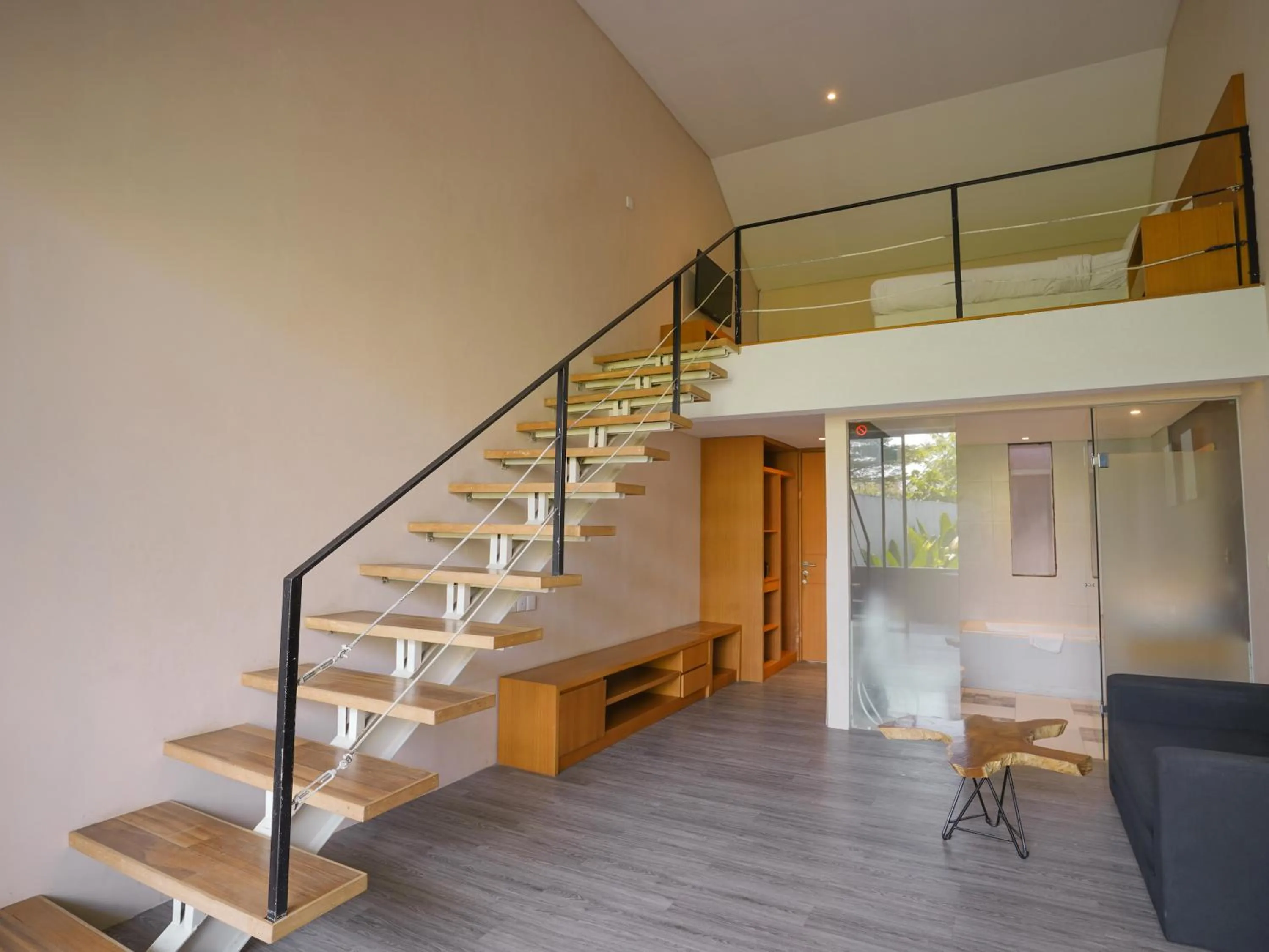 Living room in Sunrise Suite Seminyak by ARM Hospitality